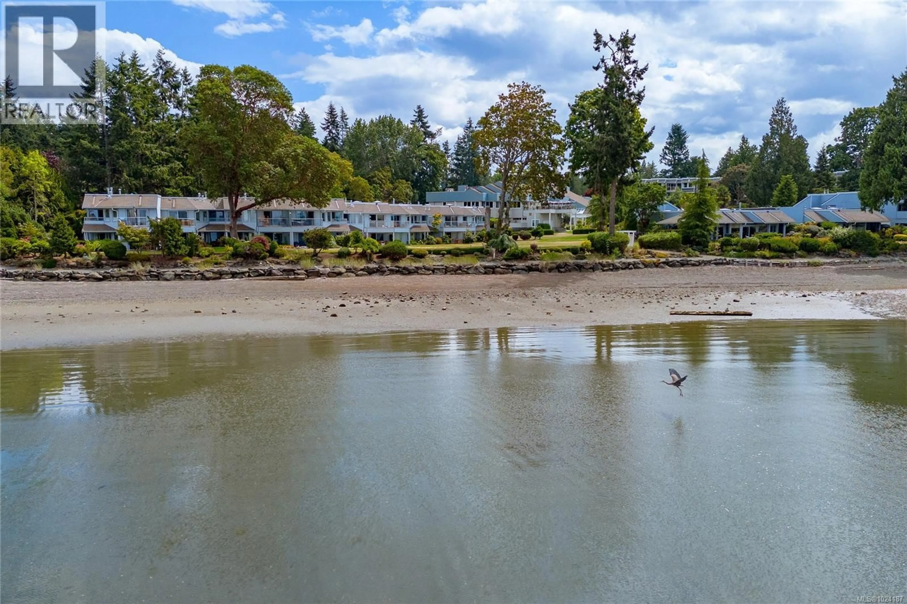 A pic from outside/outdoor area/front of a property/back of a property/a pic from drone, water/lake/river/ocean view for 613 - 1600 STROULGER ROAD, Nanoose Bay British Columbia V9P9B7