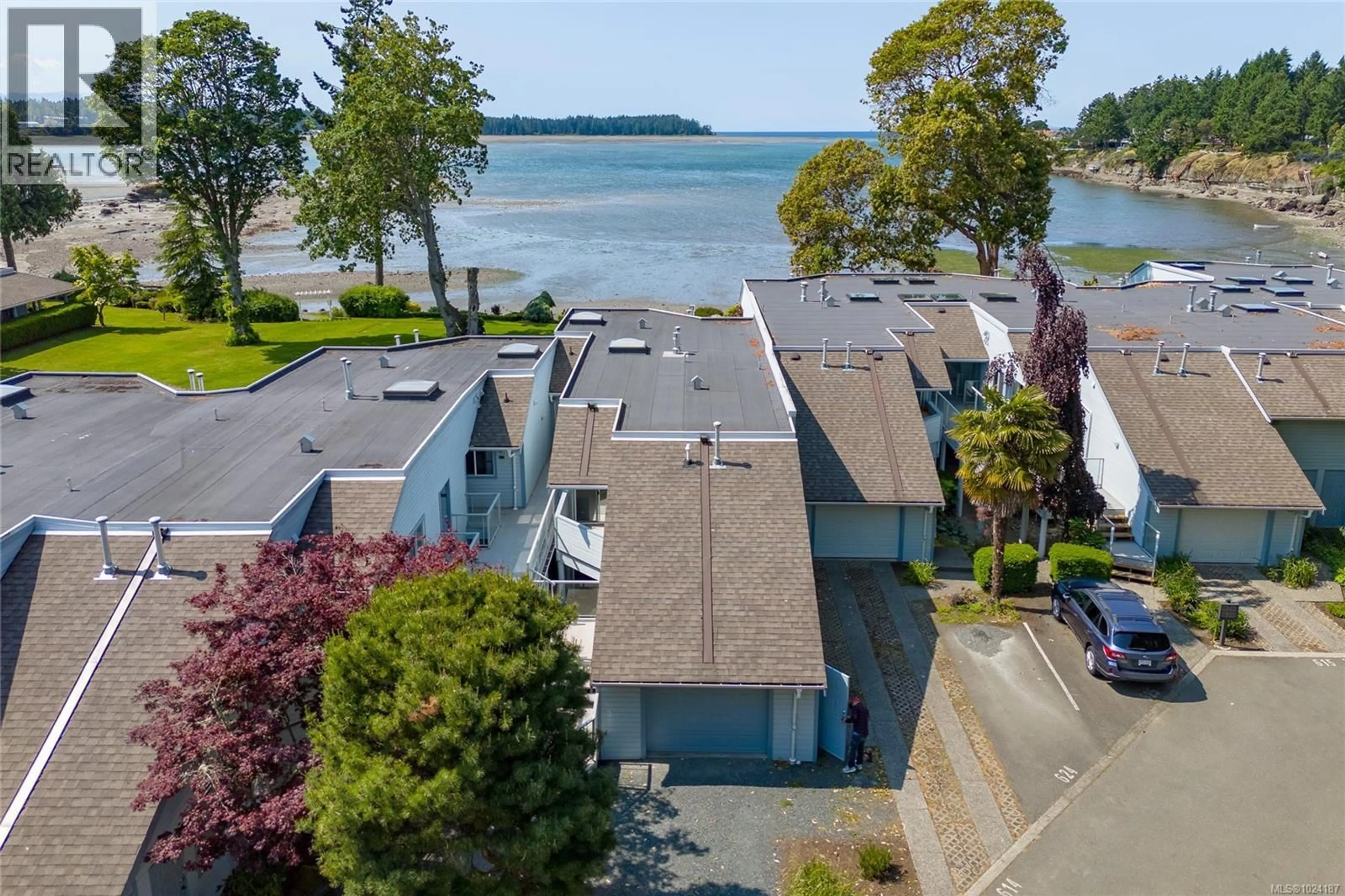 A pic from outside/outdoor area/front of a property/back of a property/a pic from drone, water/lake/river/ocean view for 613 - 1600 STROULGER ROAD, Nanoose Bay British Columbia V9P9B7