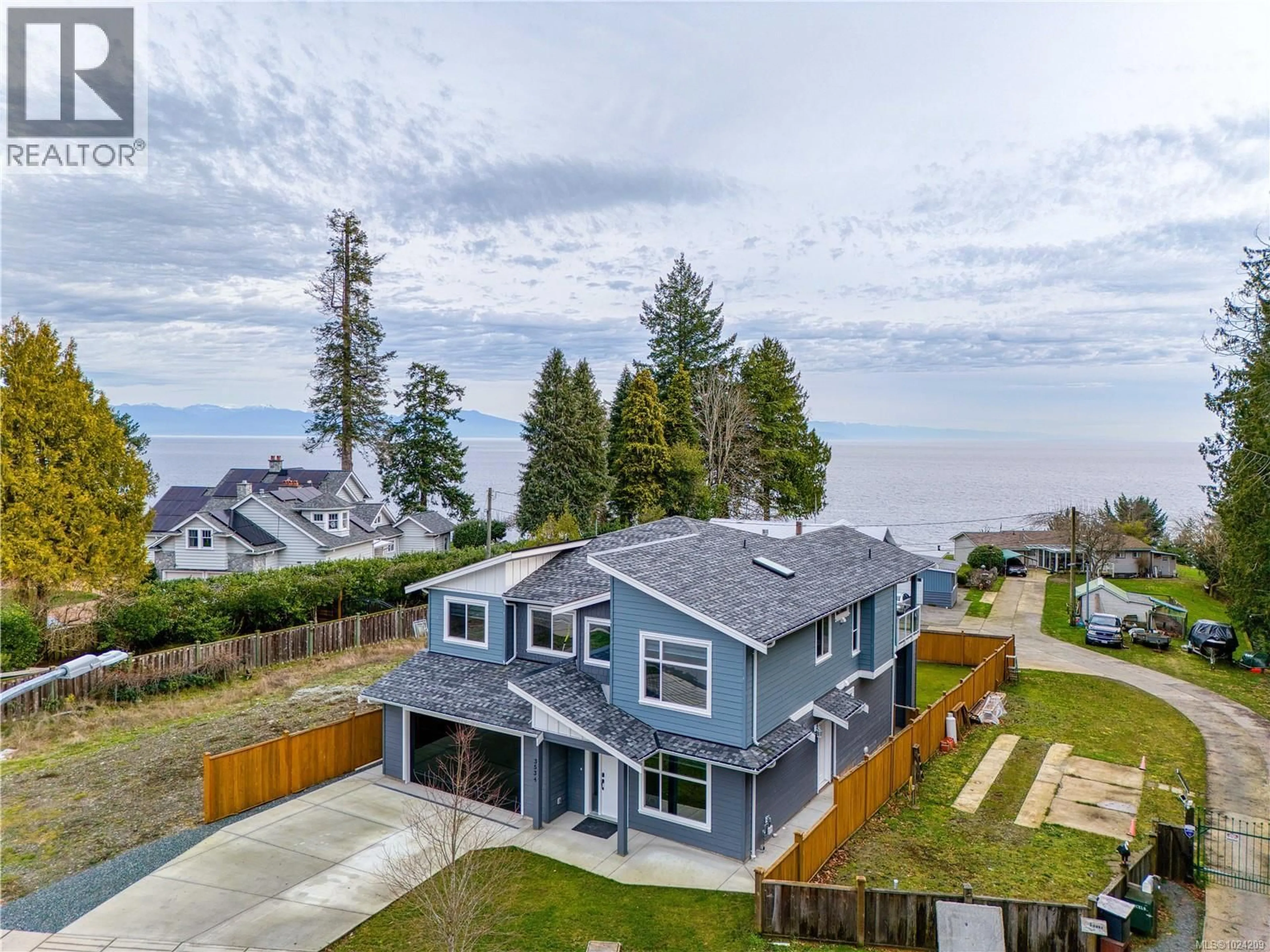 A pic from outside/outdoor area/front of a property/back of a property/a pic from drone, water/lake/river/ocean view for 3534 BONNIE DRIVE, Nanaimo British Columbia V9T0L2