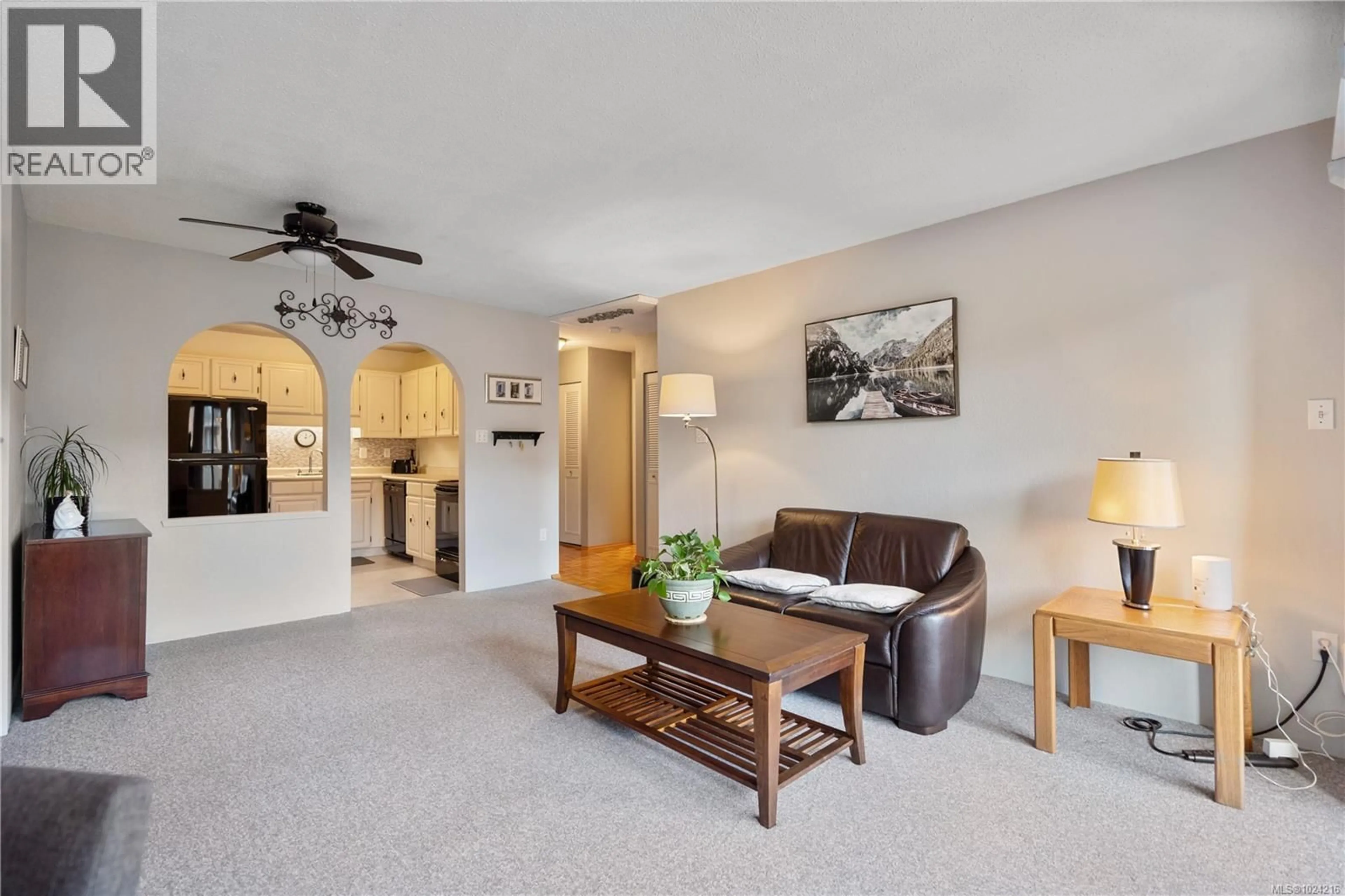 Living room with furniture, ceramic/tile floor for 309 - 1419 STADACONA AVENUE, Victoria British Columbia V8S5J3