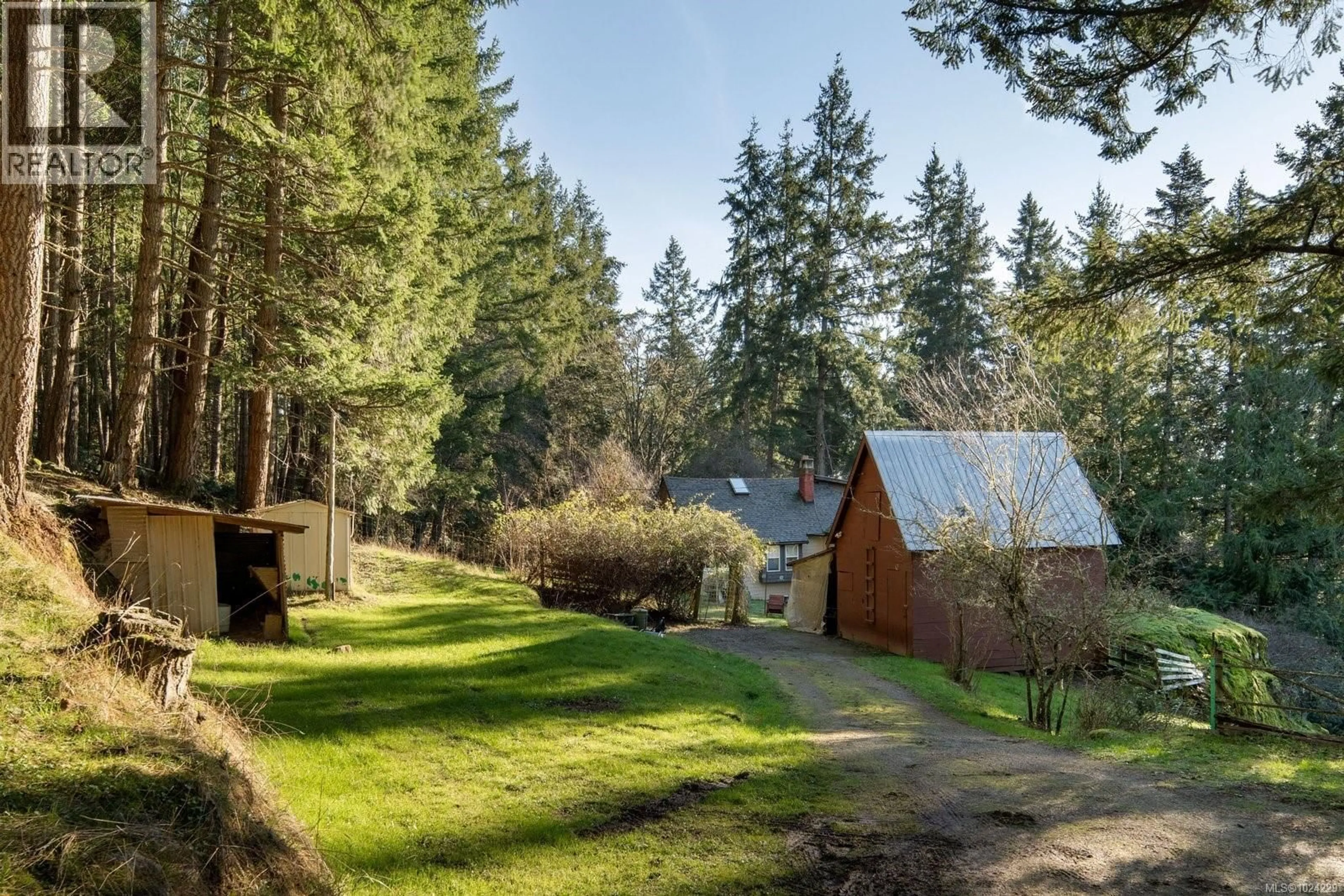 A pic from outside/outdoor area/front of a property/back of a property/a pic from drone, forest/trees view for 1183-1193 HILLGROVE ROAD, North Saanich British Columbia V8L5R8
