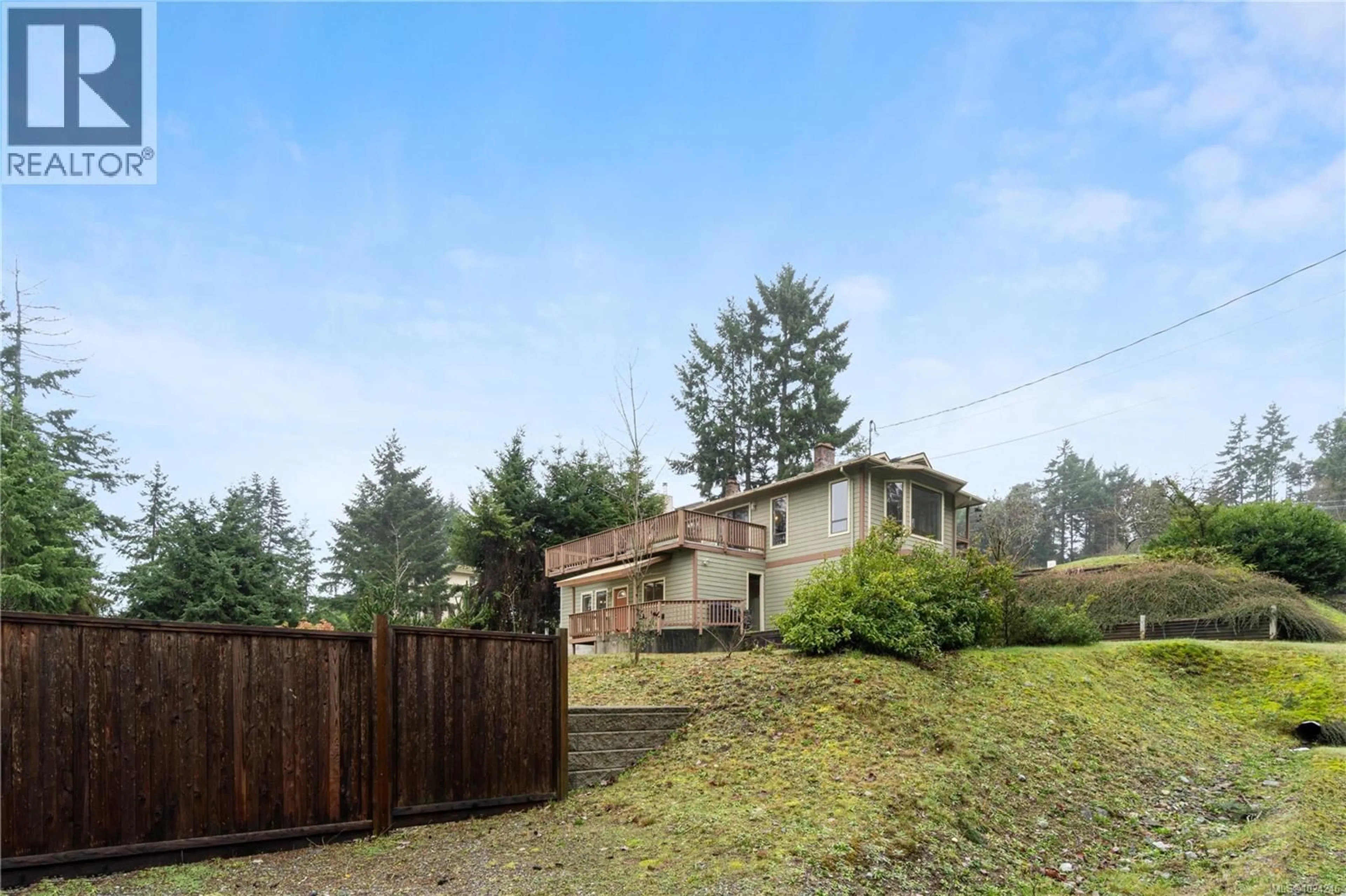 A pic from outside/outdoor area/front of a property/back of a property/a pic from drone, mountain view for 7496 CLARK CRESCENT, Lantzville British Columbia V0R2H0