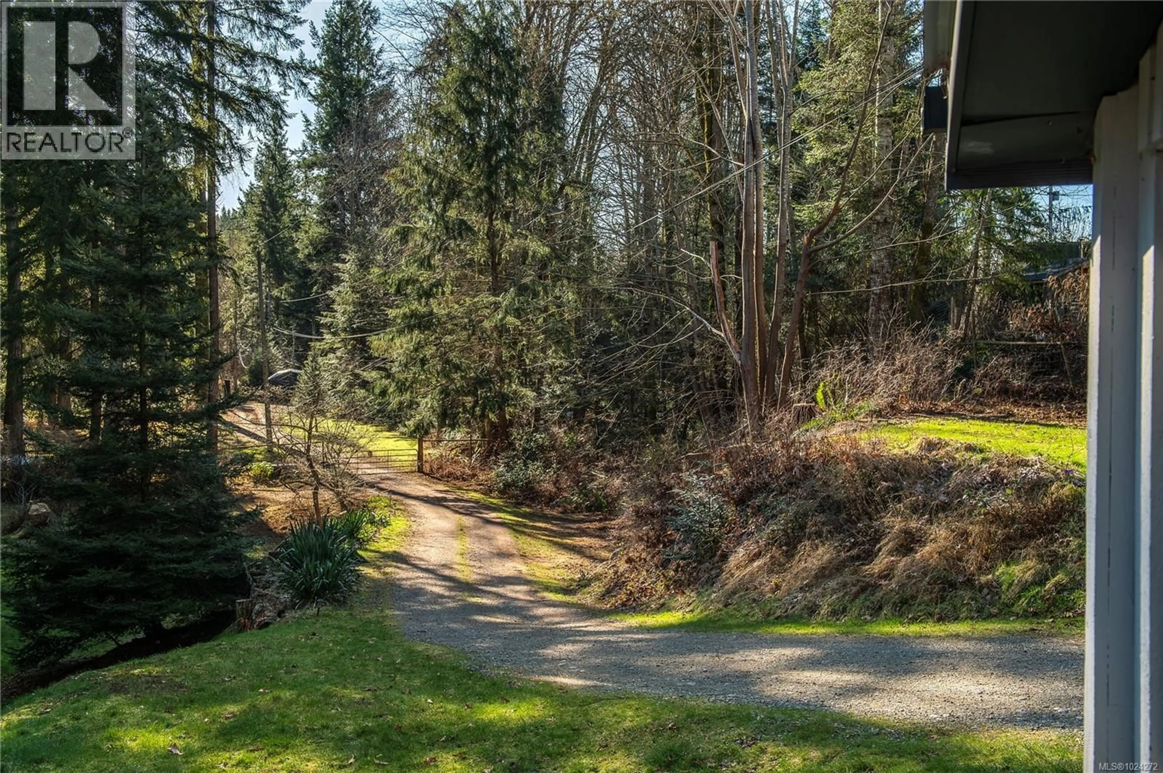 A pic from outside/outdoor area/front of a property/back of a property/a pic from drone, forest/trees view for 2404 GLENMORE ROAD, Campbell River British Columbia V9H1C9