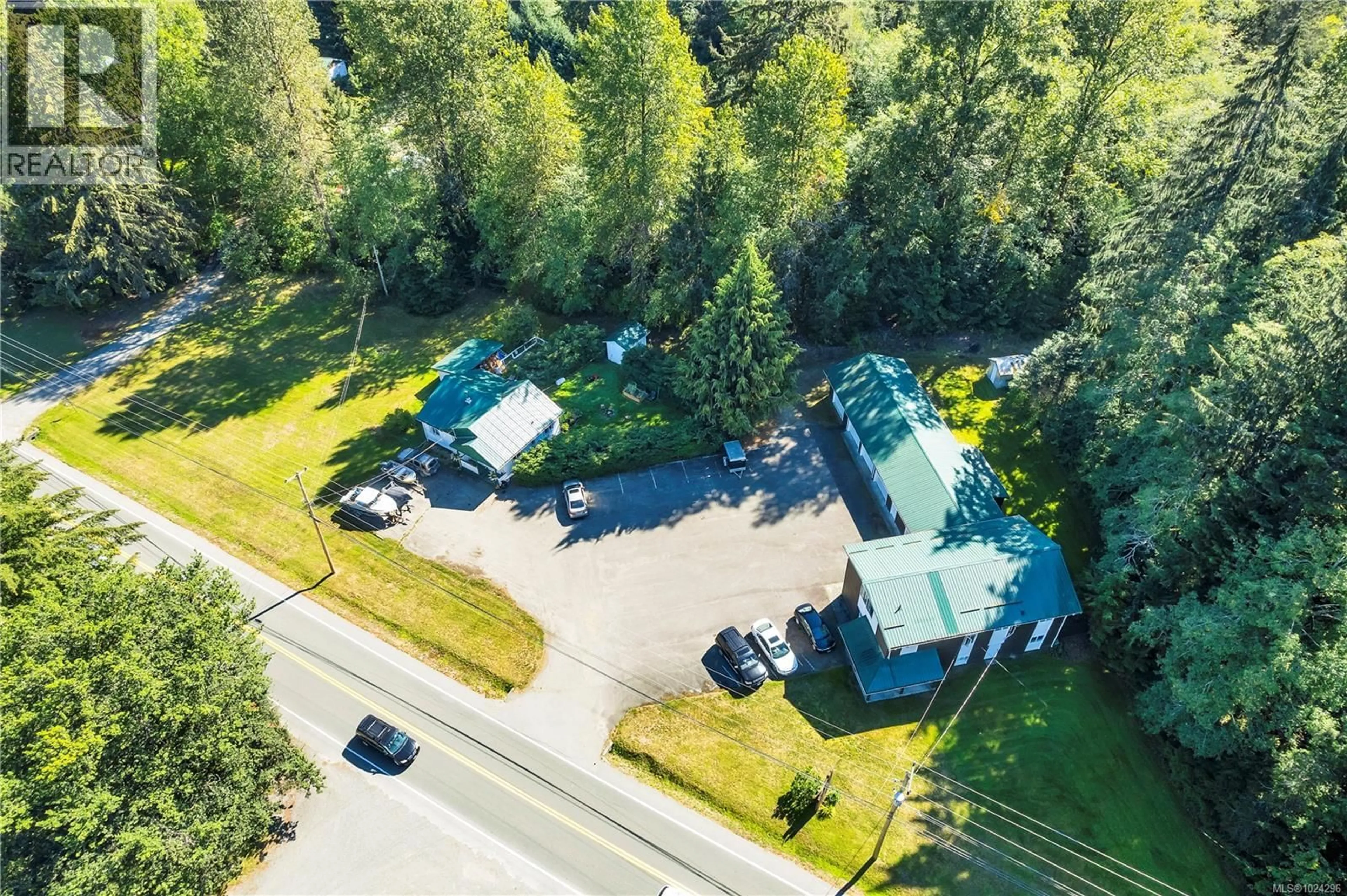 A pic from outside/outdoor area/front of a property/back of a property/a pic from drone, unknown for 1260 SAYWARD ROAD, Sayward British Columbia V0P1R0