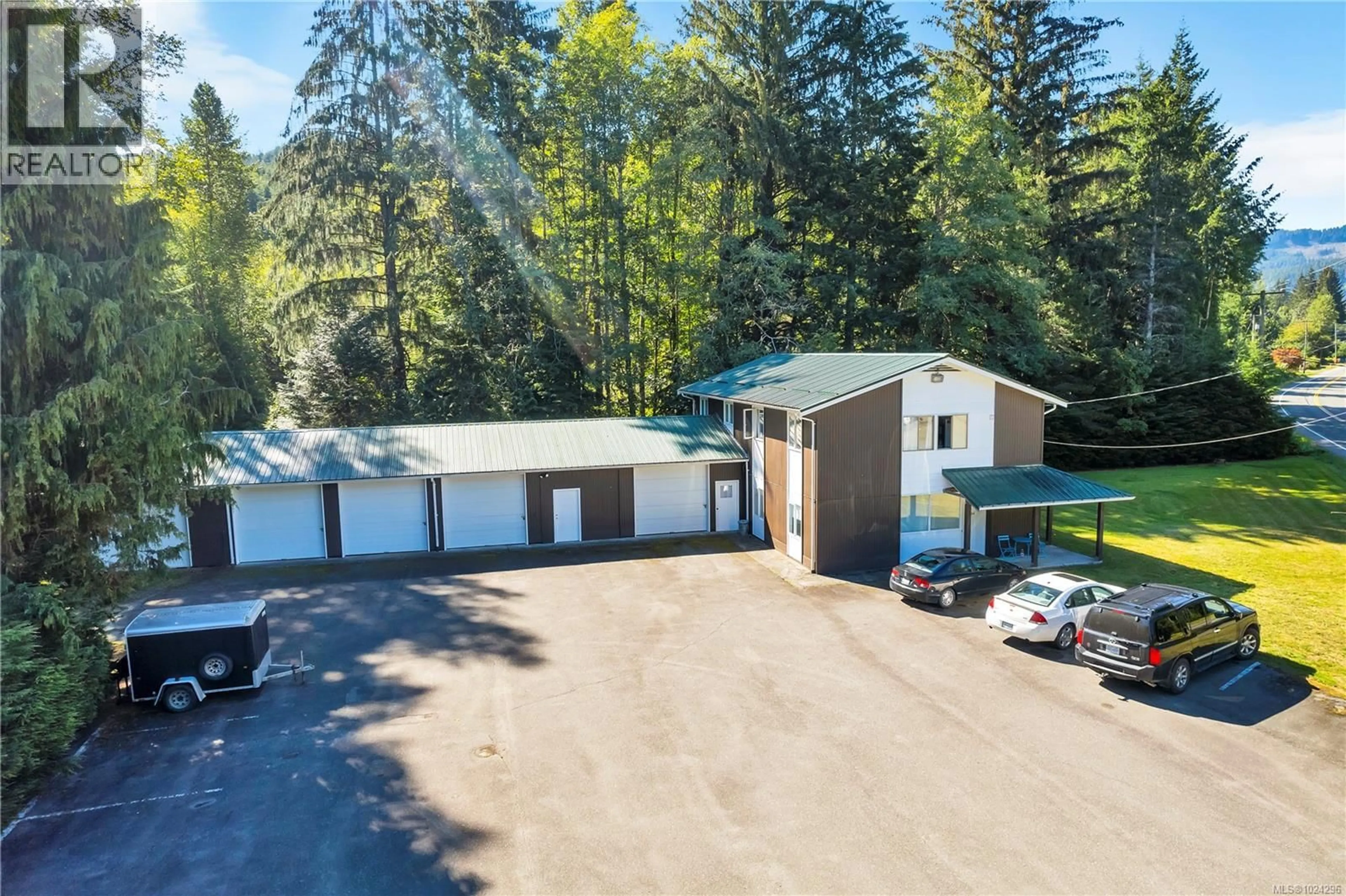 A pic from outside/outdoor area/front of a property/back of a property/a pic from drone, building for 1260 SAYWARD ROAD, Sayward British Columbia V0P1R0