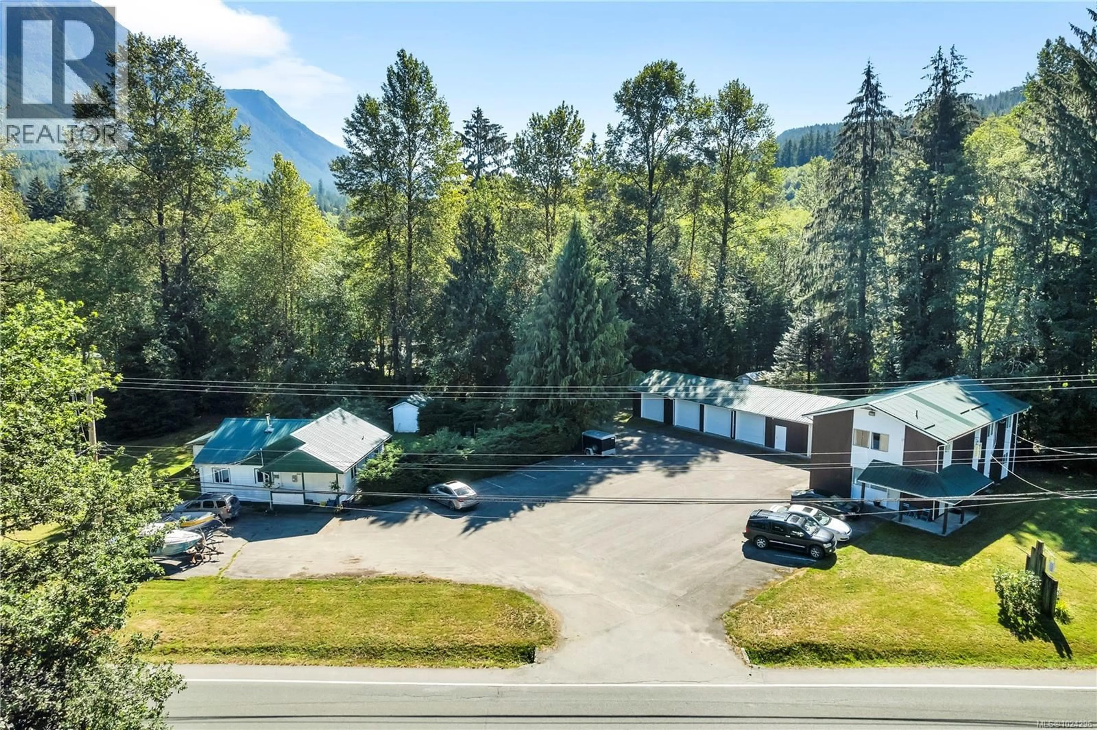 A pic from outside/outdoor area/front of a property/back of a property/a pic from drone, mountain view for 1260 SAYWARD ROAD, Sayward British Columbia V0P1R0