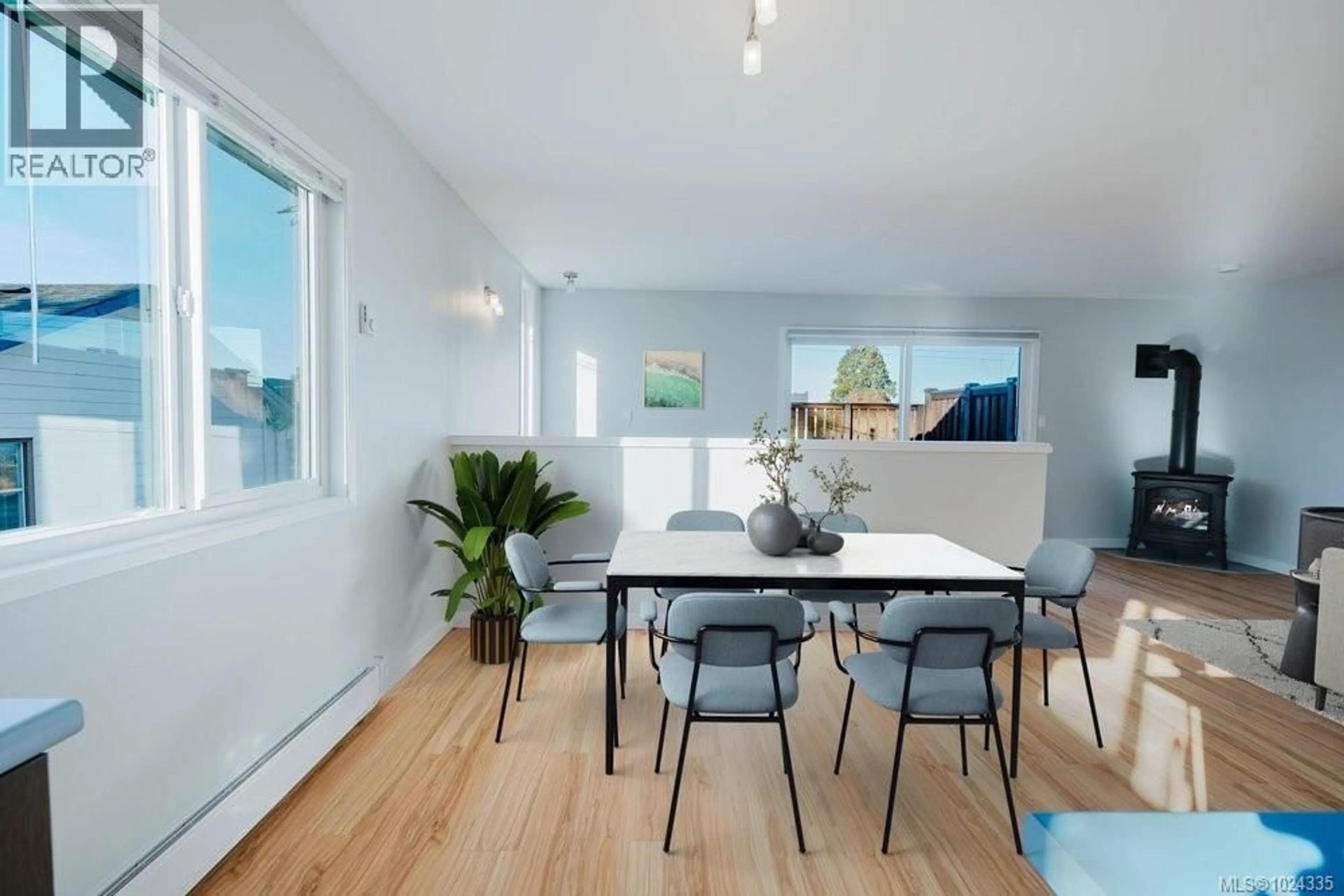 Dining room, wood/laminate floor for 841 OLD ESQUIMALT ROAD, Esquimalt British Columbia V9A4W9