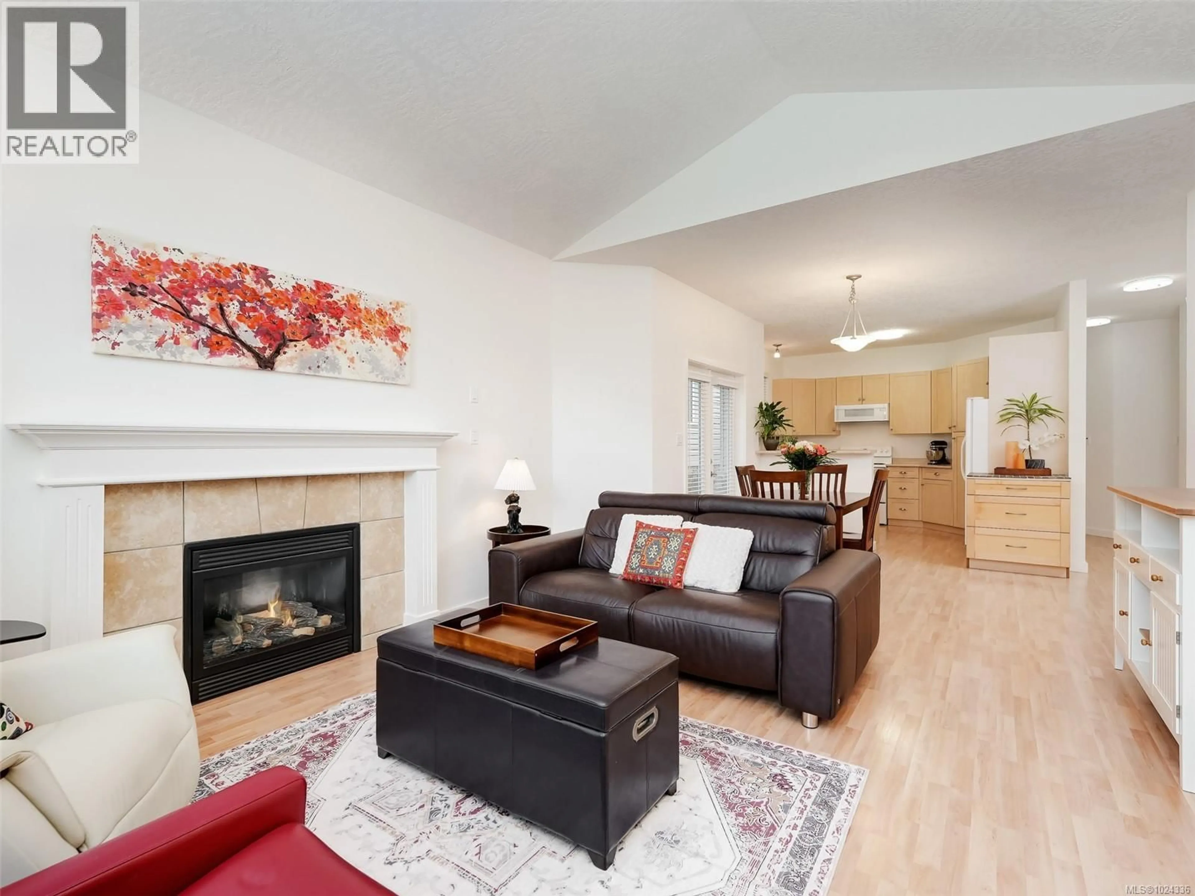 Living room with furniture, wood/laminate floor for 3705 WILD BERRY BEND, Langford British Columbia V9C4M7
