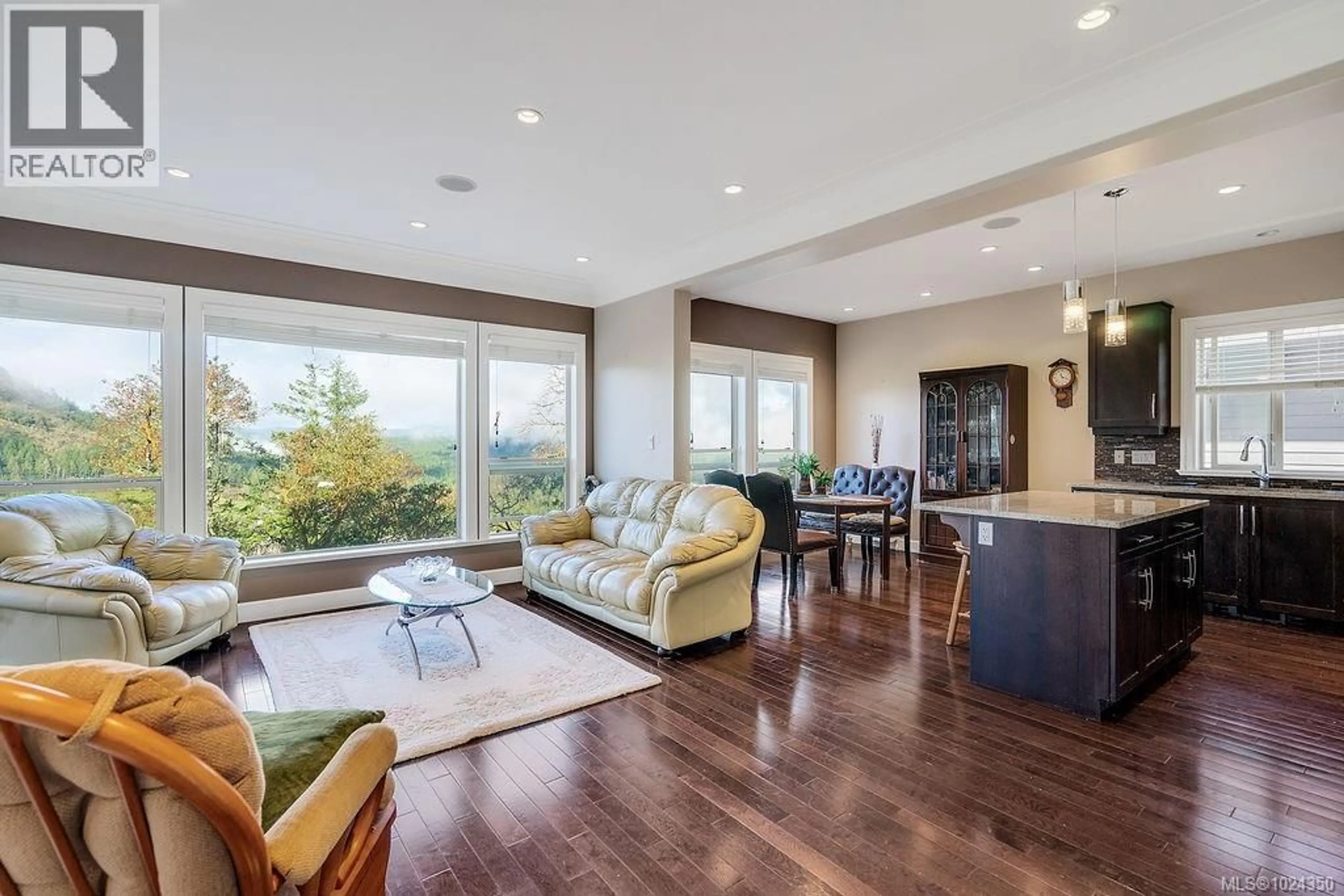 Living room with furniture, wood/laminate floor for 110 - 1177 DEERVIEW PLACE, Langford British Columbia V9B0B3