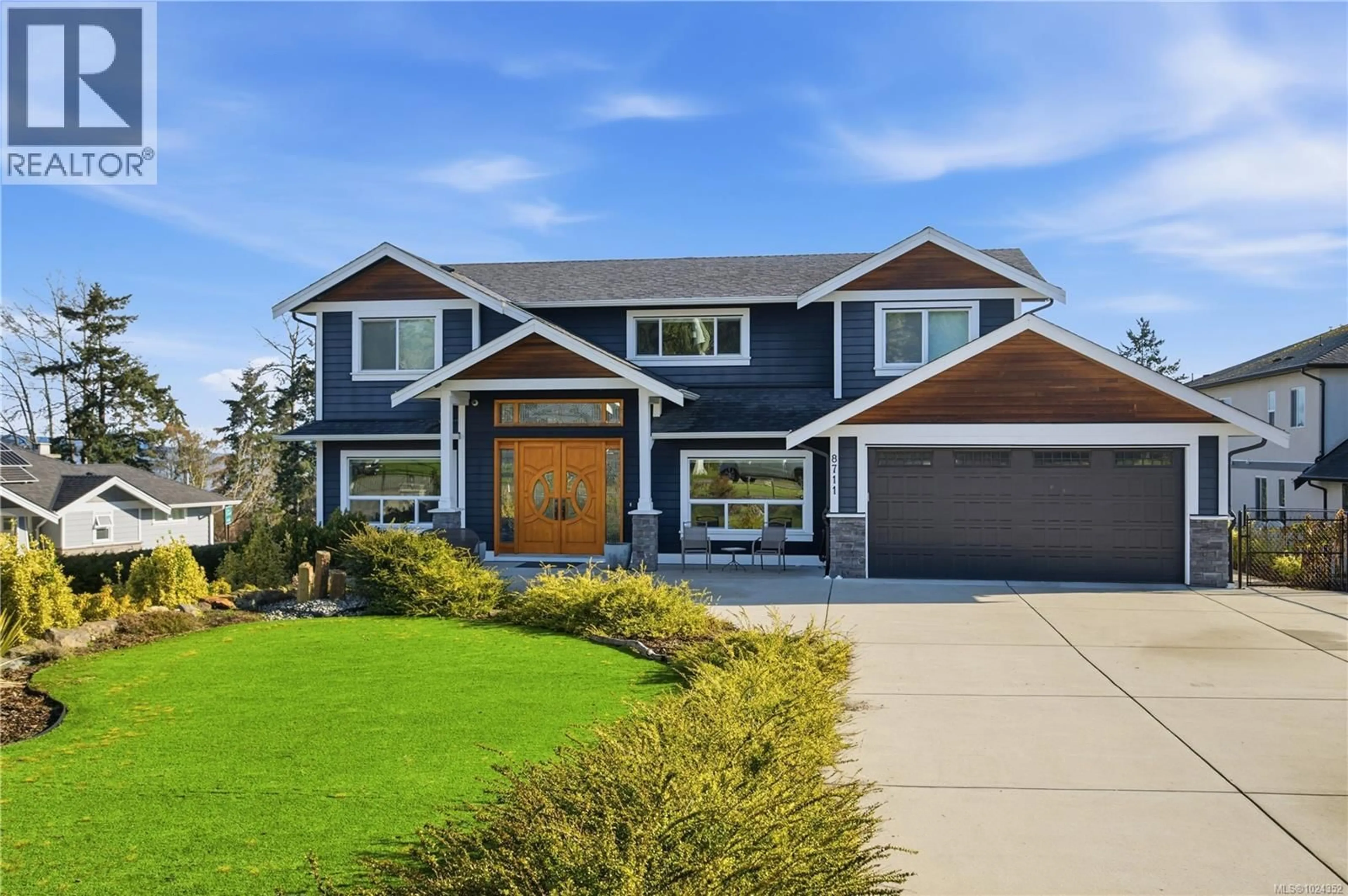 Home with vinyl exterior material, street for 8711 BOURNE TERRACE, North Saanich British Columbia V8L1L8