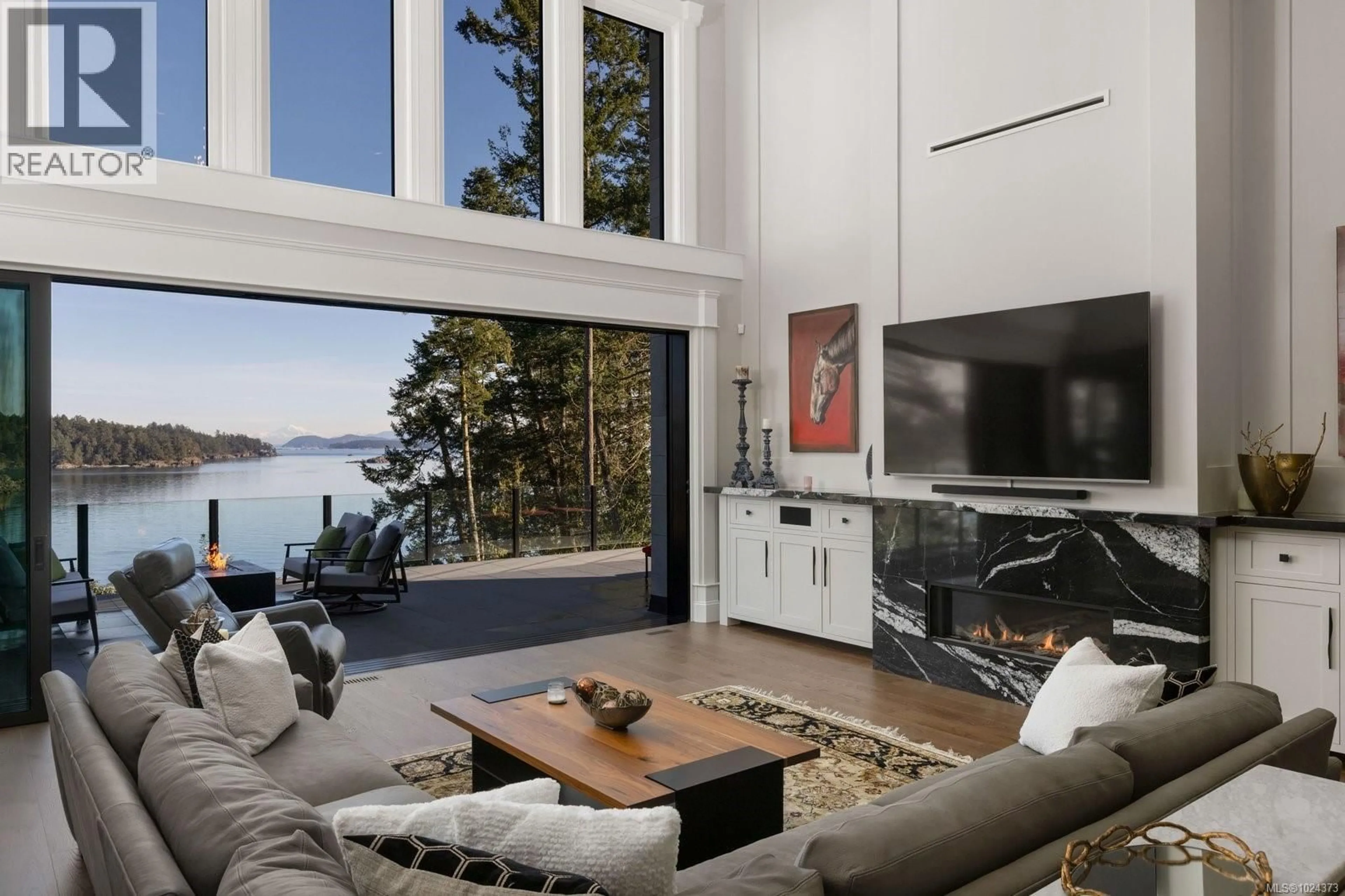 Living room with furniture, unknown for 10865 FERNIE WYND ROAD, North Saanich British Columbia V8L5H8