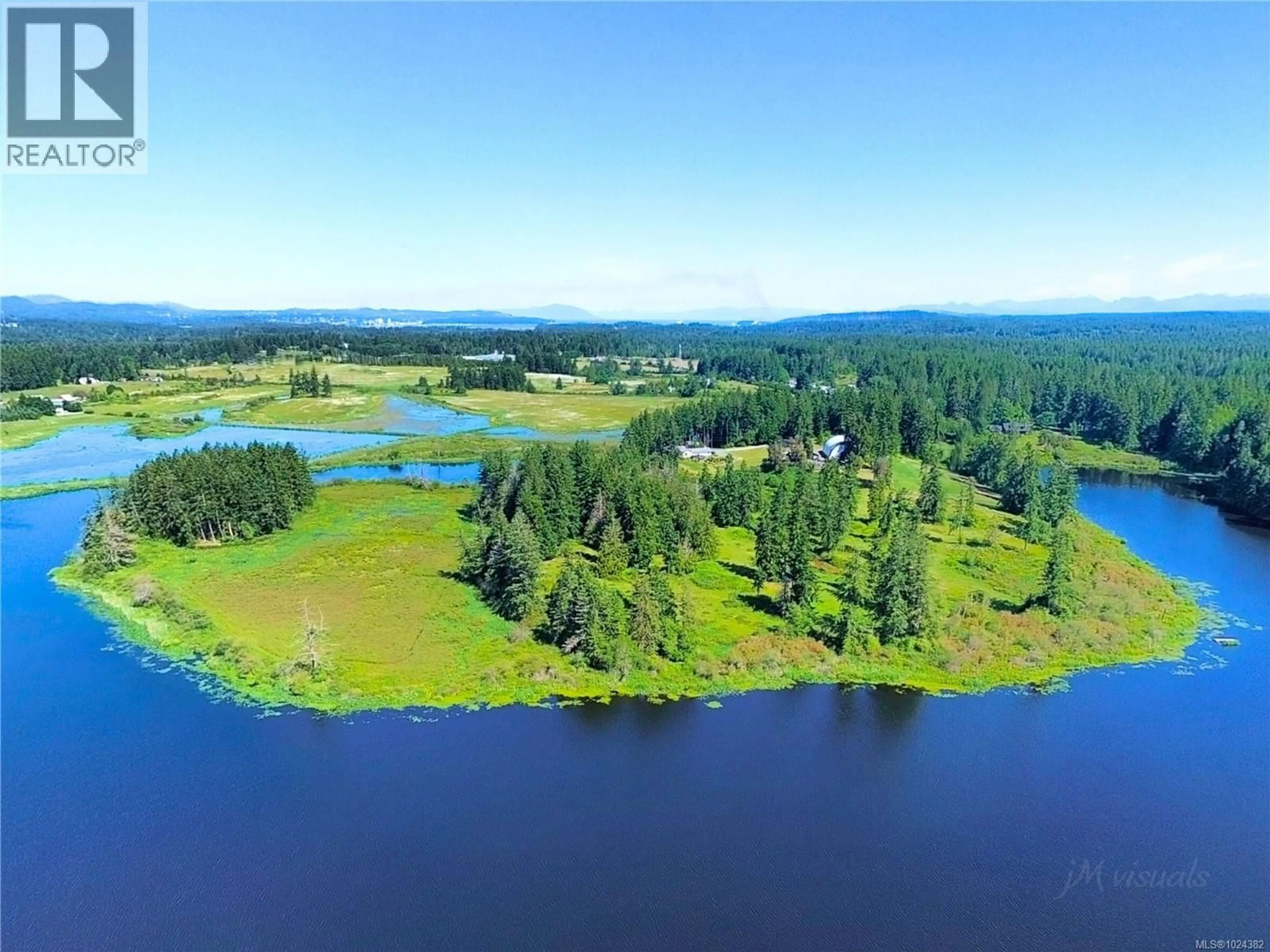 A pic from outside/outdoor area/front of a property/back of a property/a pic from drone, water/lake/river/ocean view for 2551 BRAUN ROAD, Nanaimo British Columbia V9X1W5