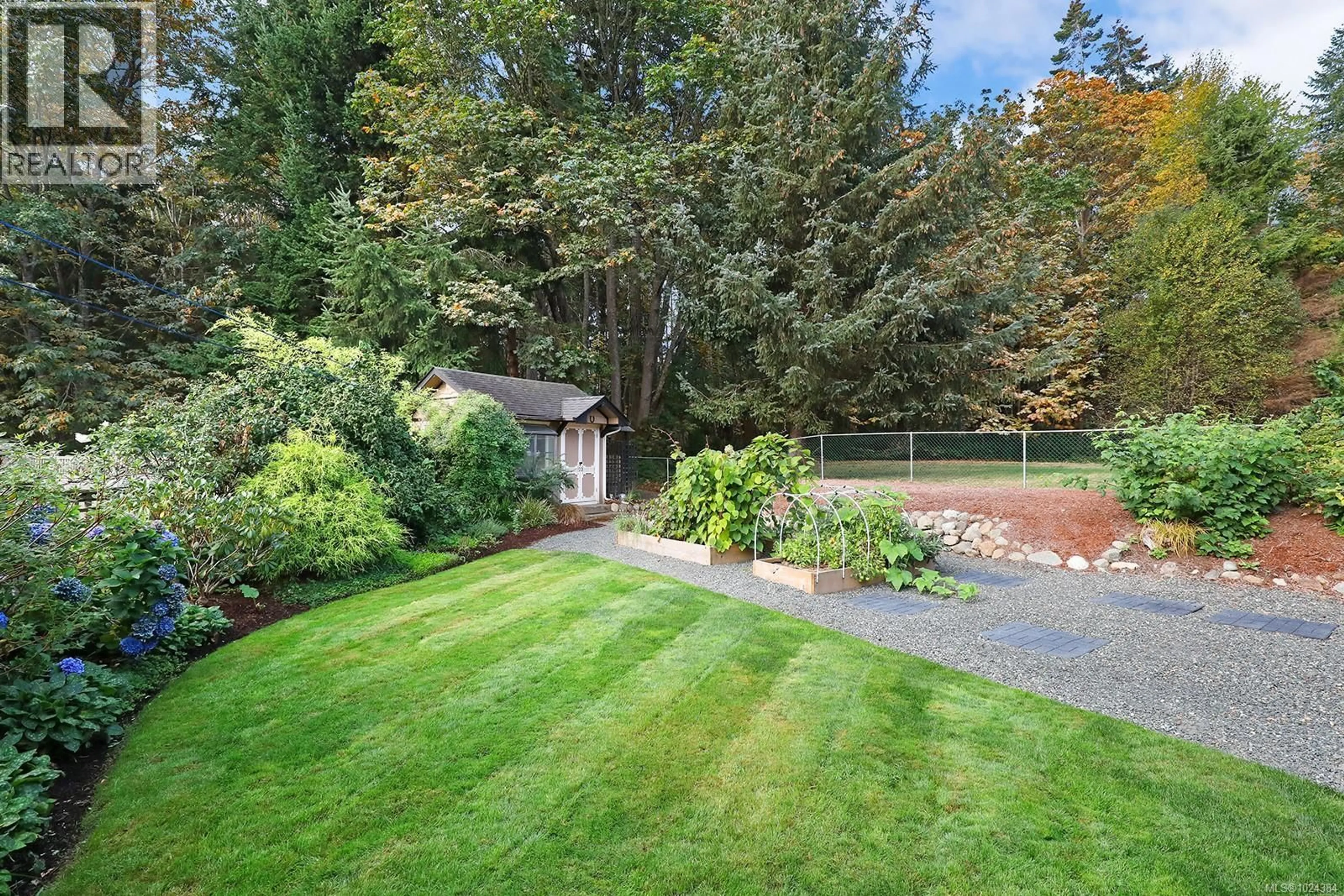 A pic from outside/outdoor area/front of a property/back of a property/a pic from drone, unknown for 204 SPINDRIFT ROAD, Courtenay British Columbia V9N9S8