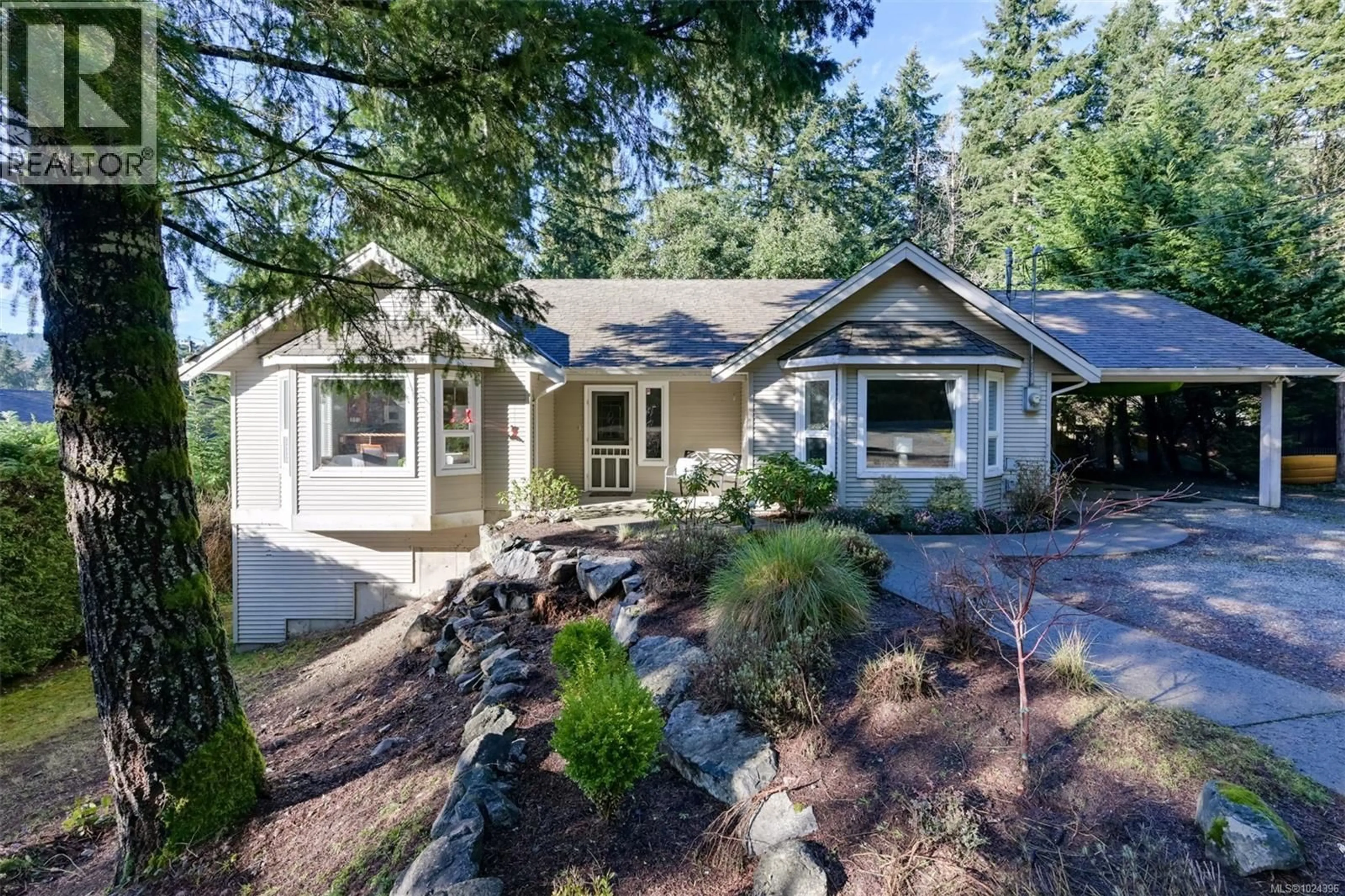 Home with vinyl exterior material, street for 2750 SCOBHAL ROAD, Shawnigan Lake British Columbia V8H2E8