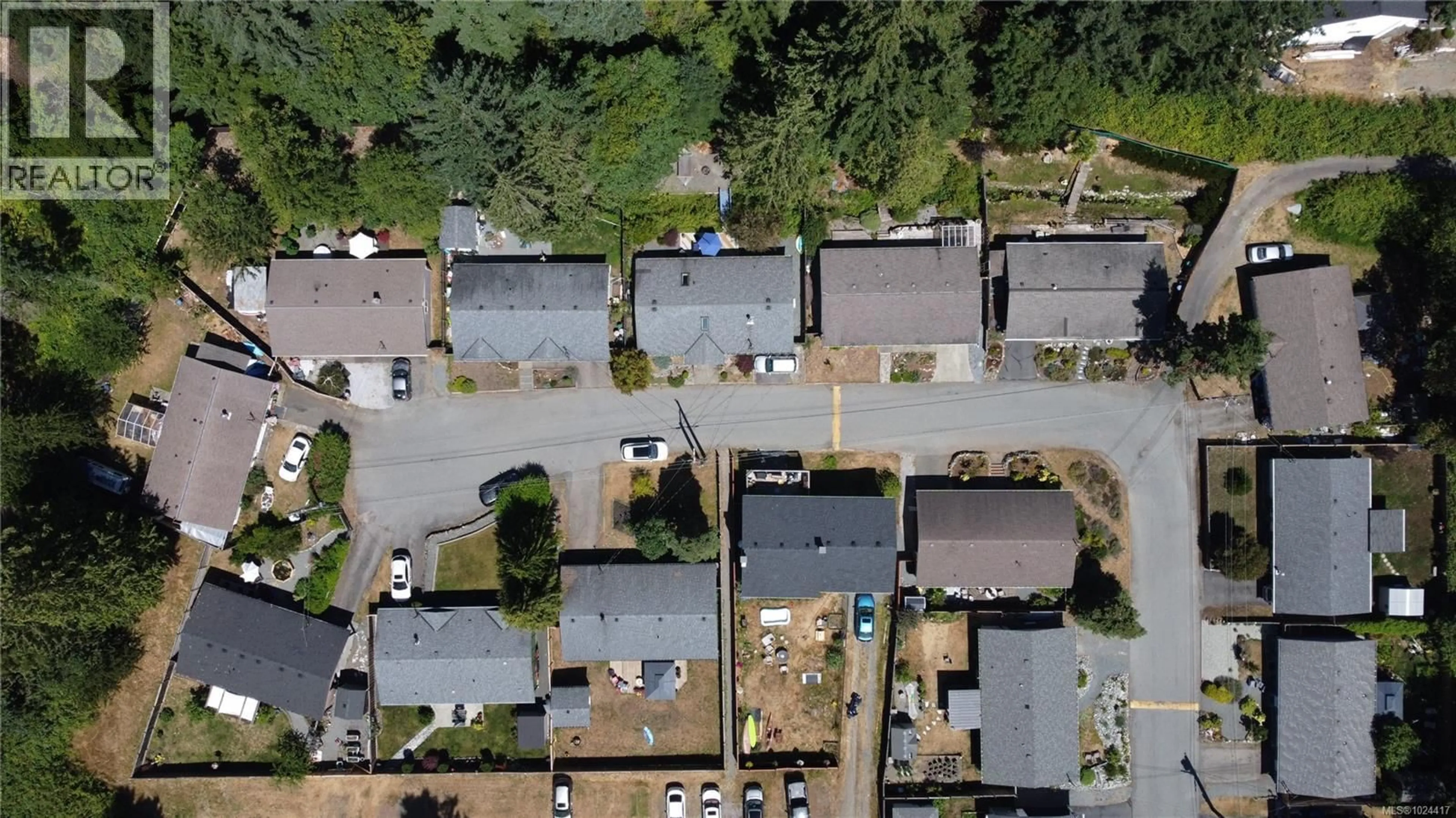 A pic from outside/outdoor area/front of a property/back of a property/a pic from drone, street for 7 - 4604 HAMMOND BAY ROAD, Nanaimo British Columbia V9T5B1