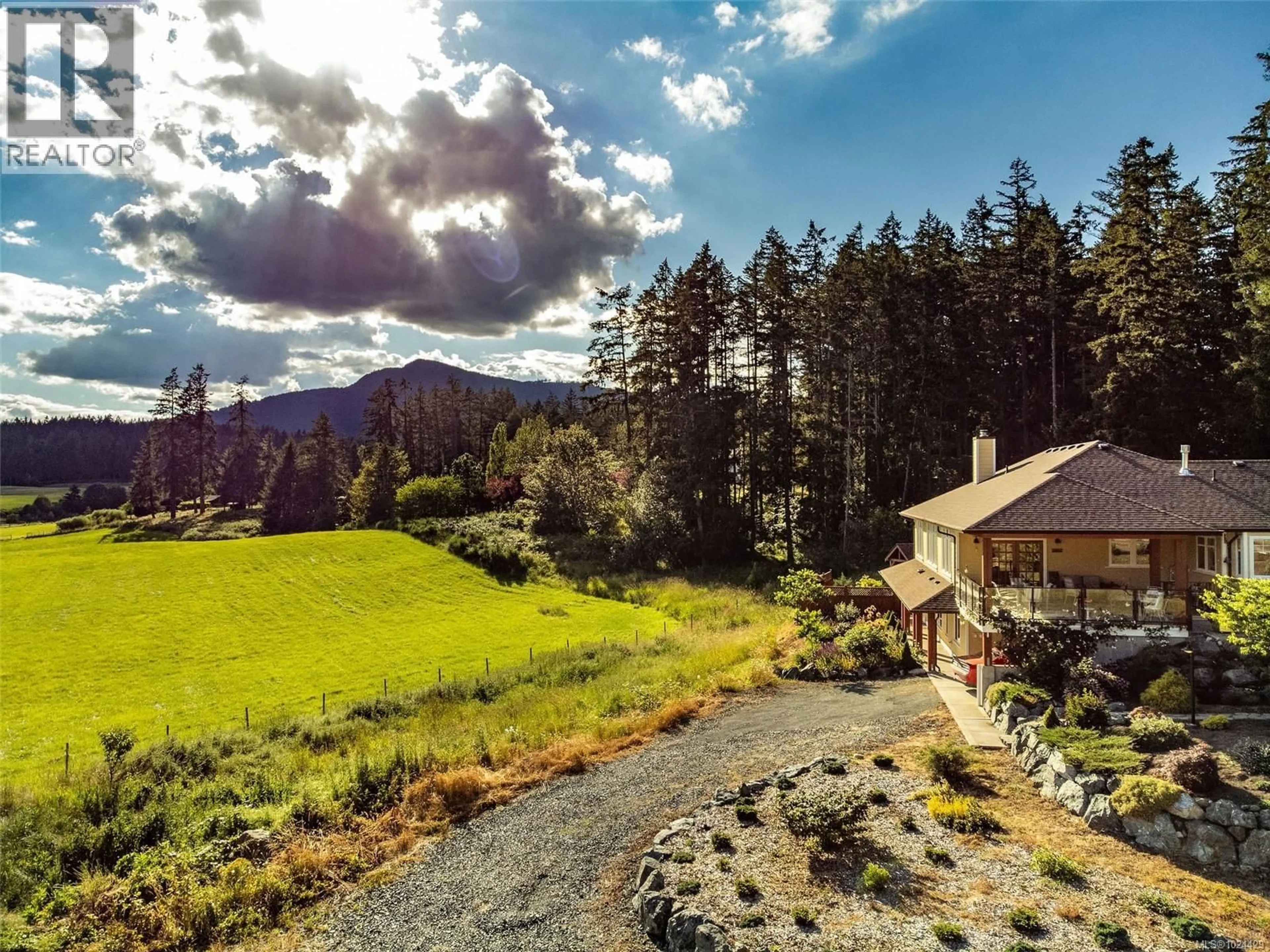 A pic from outside/outdoor area/front of a property/back of a property/a pic from drone, mountain view for 7000 MAYS ROAD, Duncan British Columbia V9L6A6