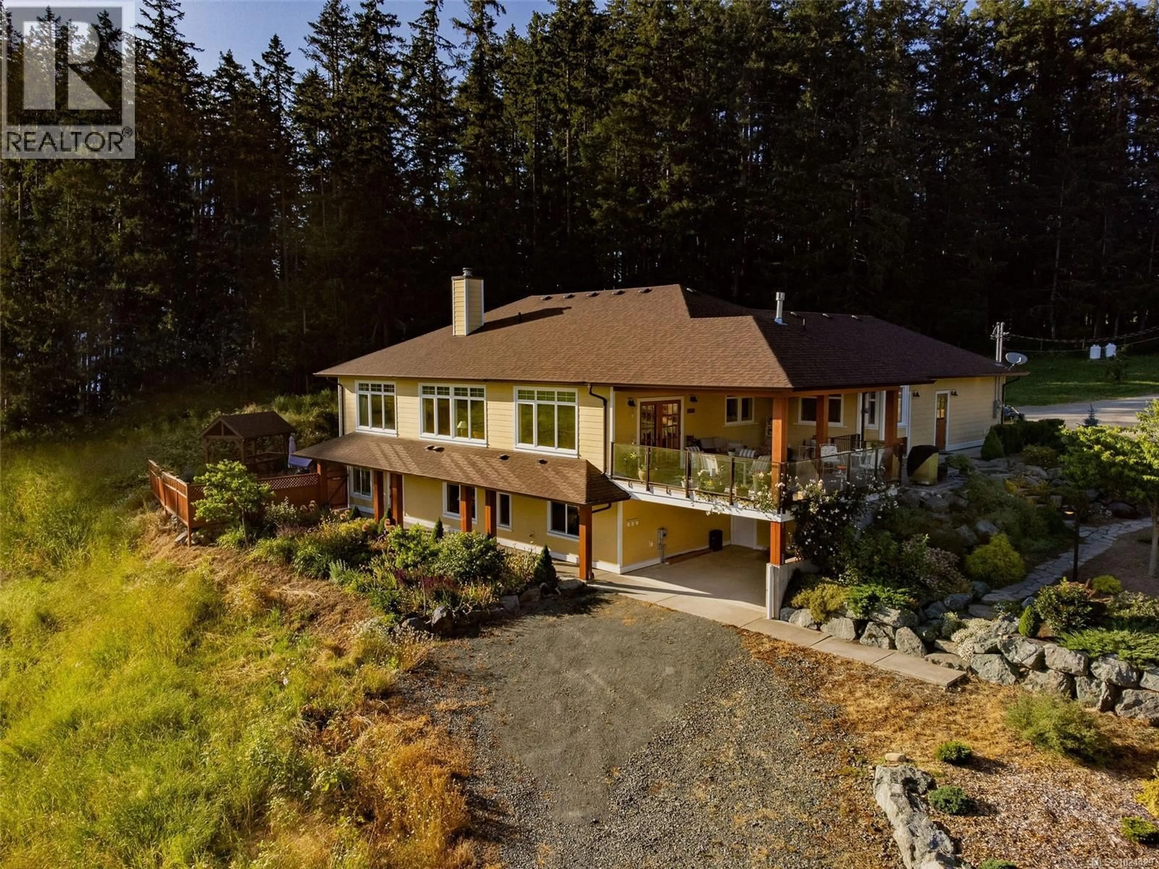 A pic from outside/outdoor area/front of a property/back of a property/a pic from drone, unknown for 7000 MAYS ROAD, Duncan British Columbia V9L6A6