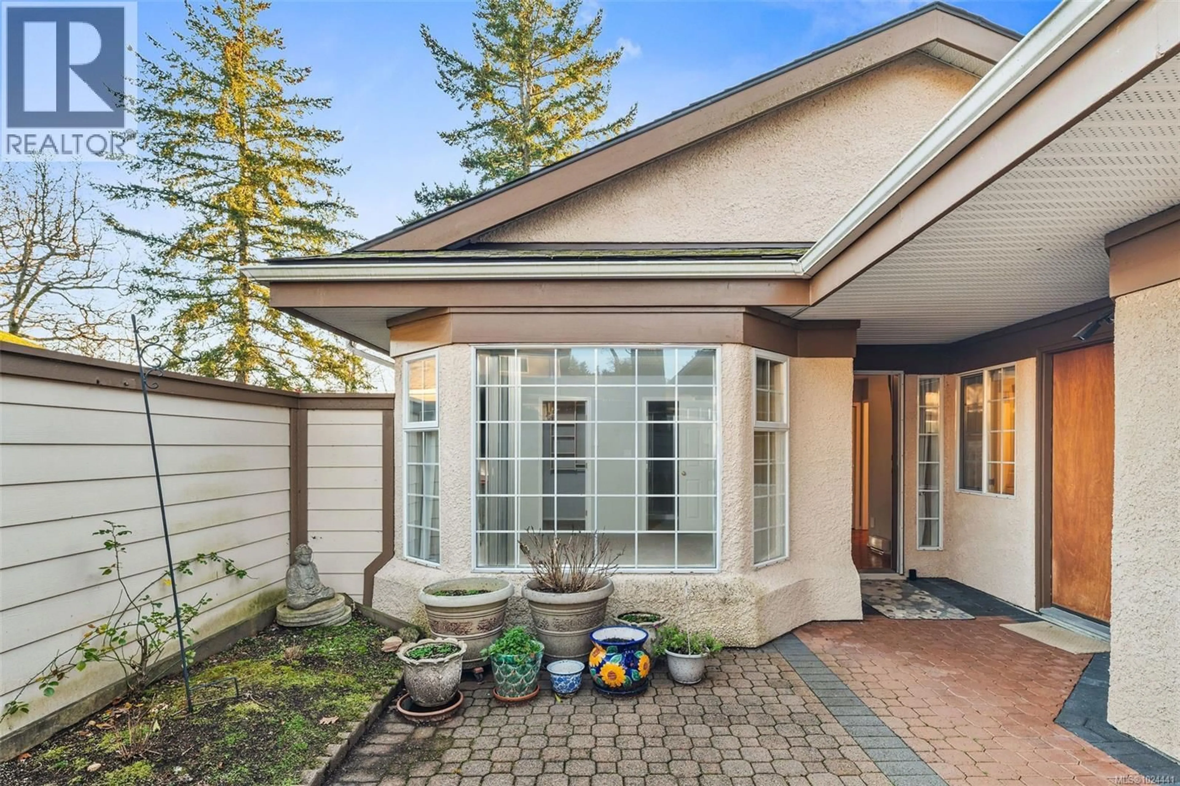 Home with brick exterior material, street for 22 - 901 KENTWOOD LANE, Saanich British Columbia V8Y2Y6