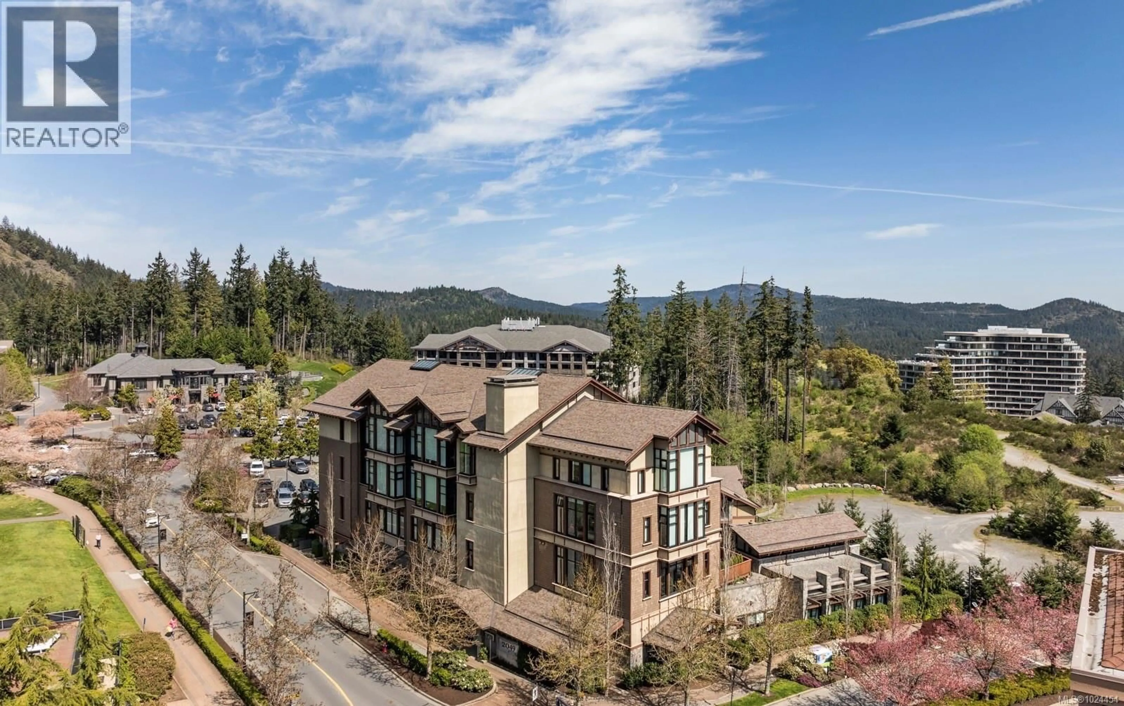 A pic from outside/outdoor area/front of a property/back of a property/a pic from drone, mountain view for 108 - 2049 COUNTRY CLUB WAY, Langford British Columbia V9B0H8