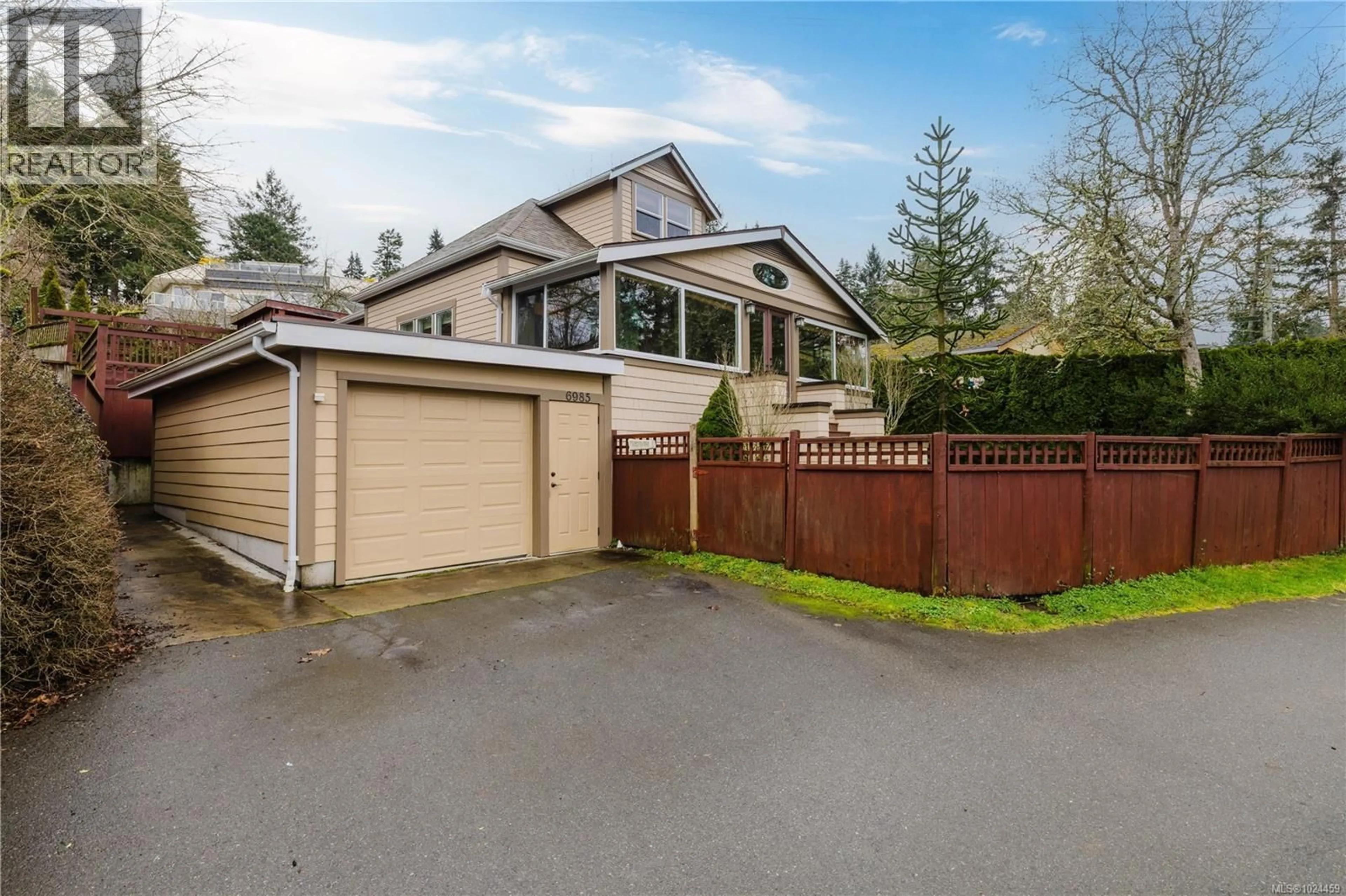 A pic from outside/outdoor area/front of a property/back of a property/a pic from drone, street for 6985 ANGLERS LANE, Central Saanich British Columbia V8M1B5