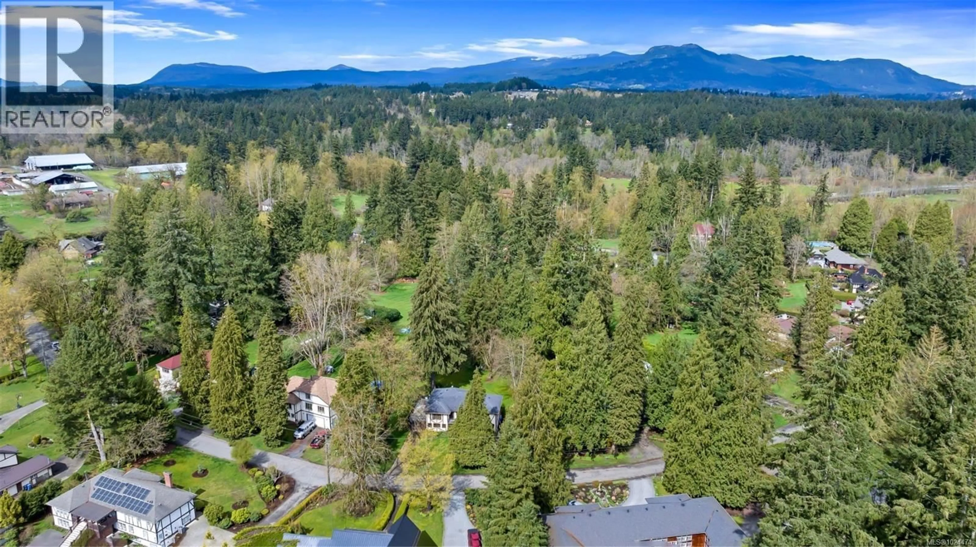 A pic from outside/outdoor area/front of a property/back of a property/a pic from drone, forest/trees view for 4752 FAIRBRIDGE DRIVE, Duncan British Columbia V9L6N8