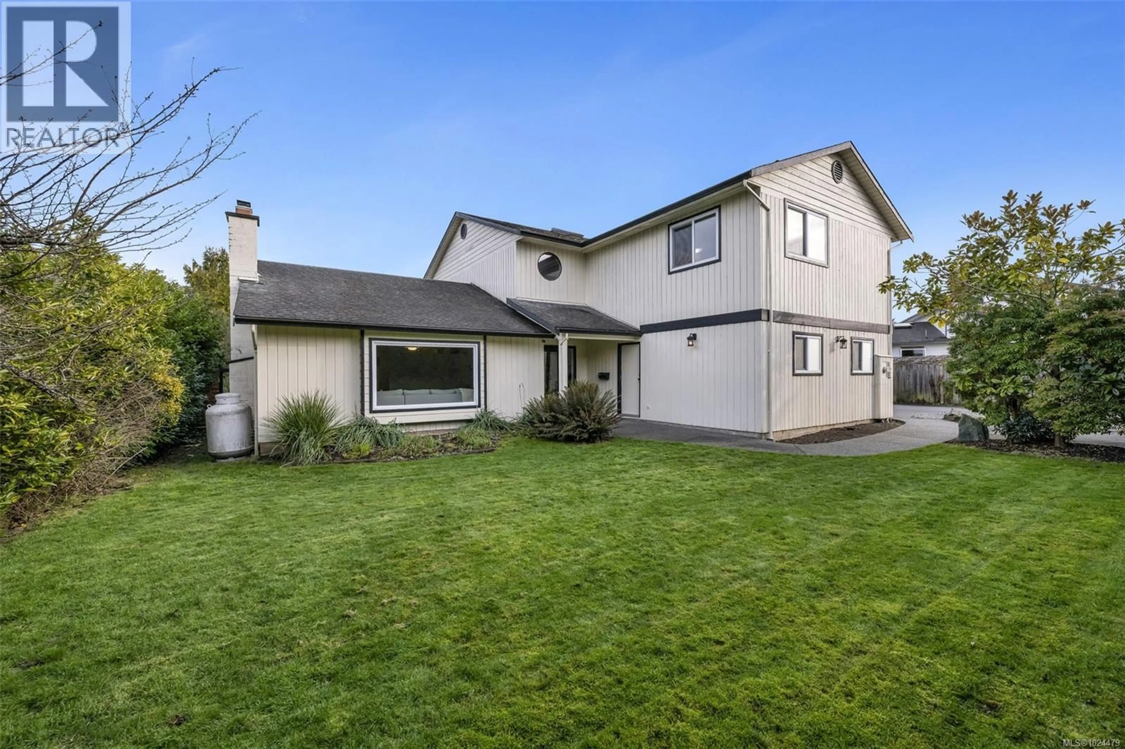 A pic from outside/outdoor area/front of a property/back of a property/a pic from drone, street for 10369 BOWERBANK ROAD, Sidney British Columbia V8L3L6