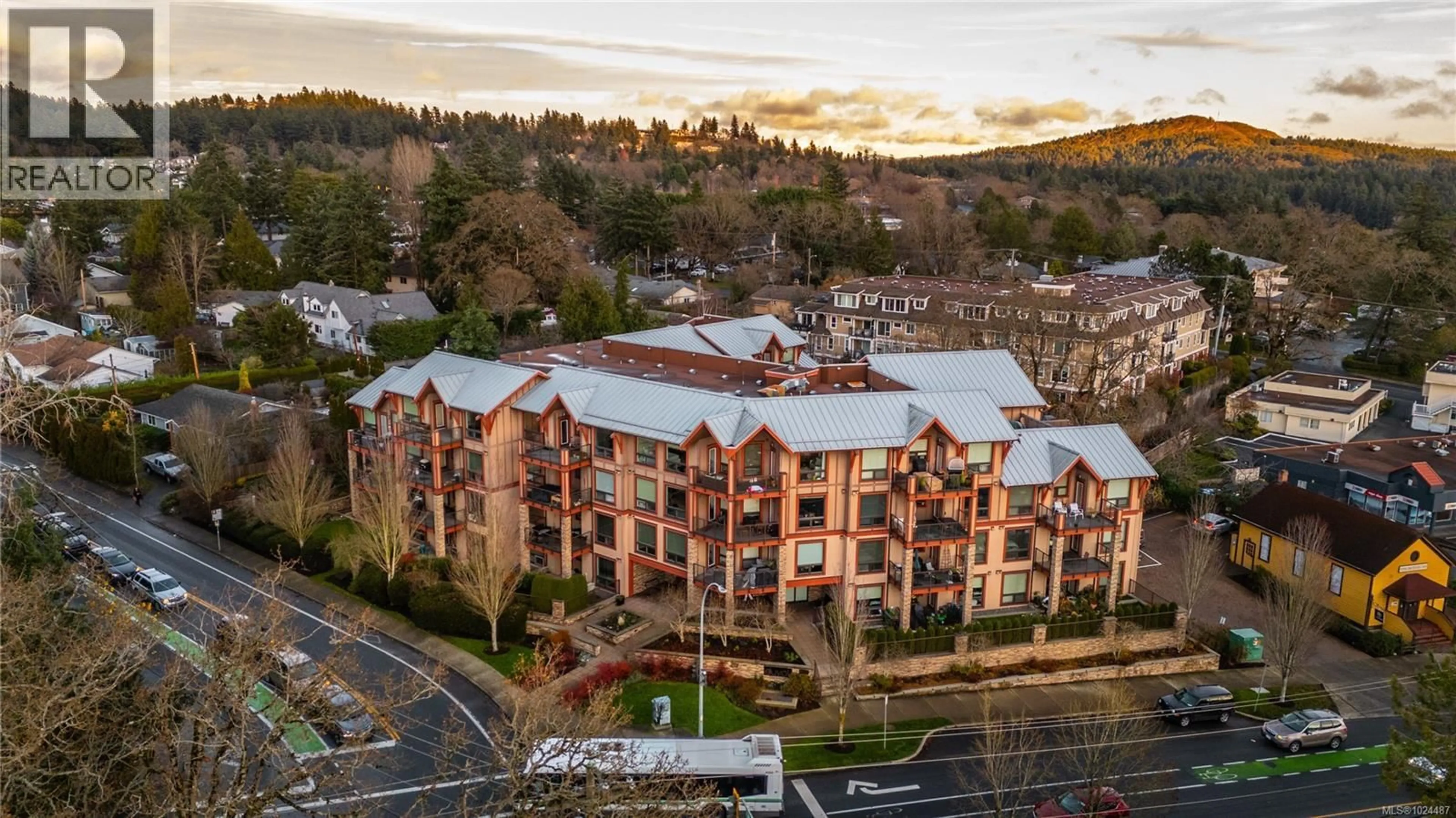 A pic from outside/outdoor area/front of a property/back of a property/a pic from drone, mountain view for 103 - 4529 WEST SAANICH ROAD, Saanich British Columbia V8Z3G3