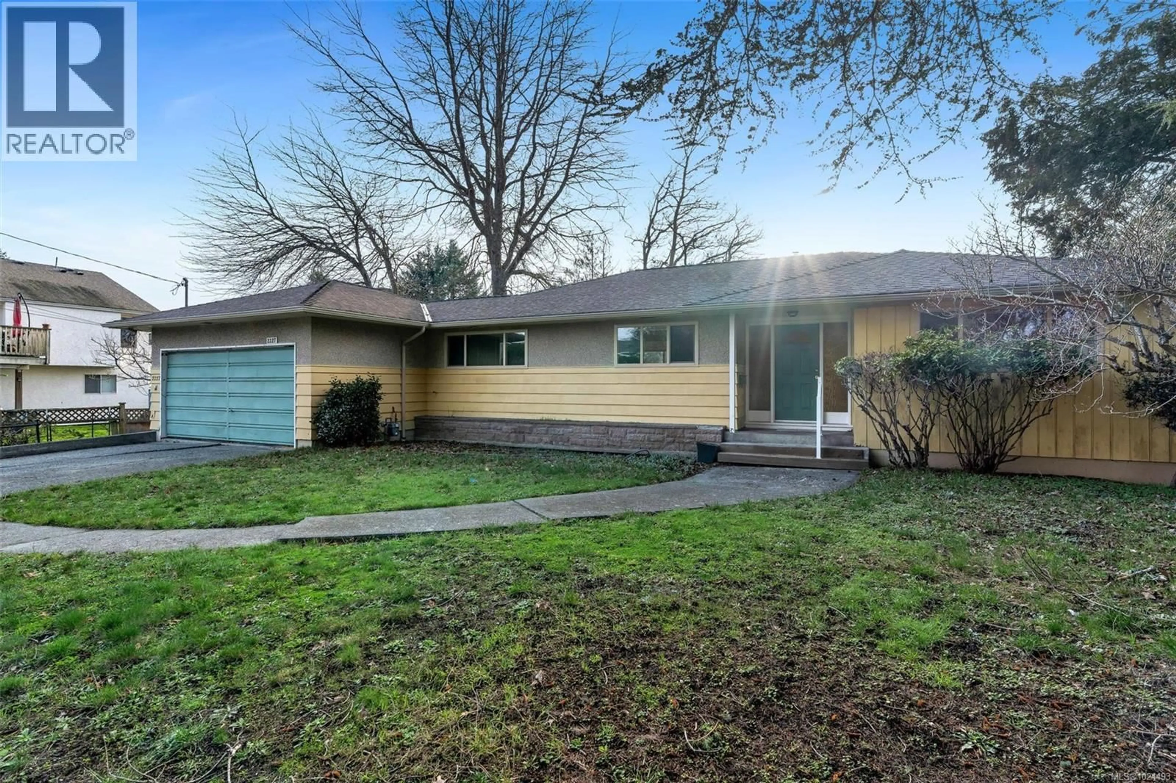 Home with vinyl exterior material, street for 2227 EDGELOW STREET, Saanich British Columbia V8N1R6