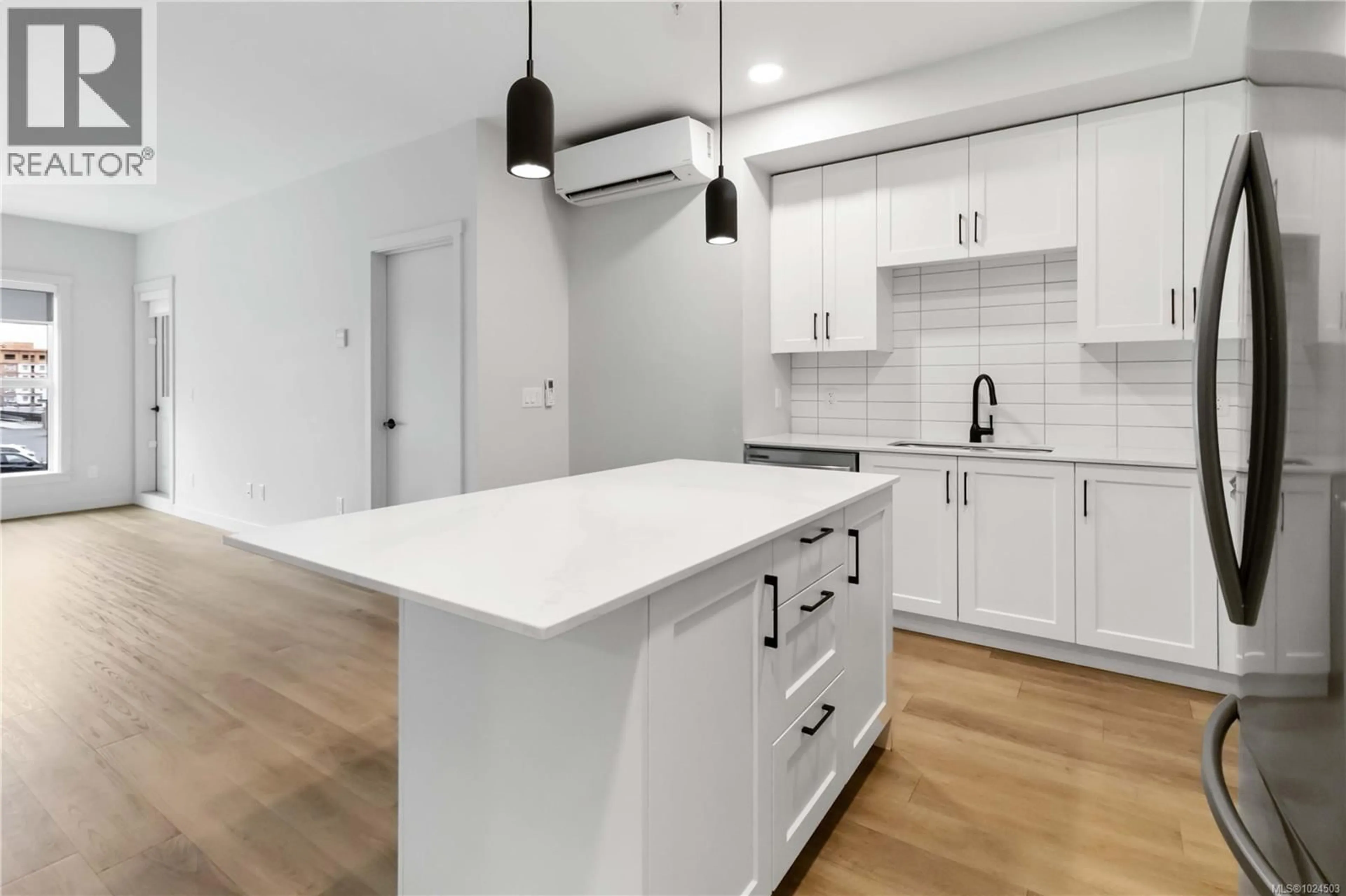 Open concept kitchen, unknown for 206 - 2469 GATEWAY ROAD, Langford British Columbia V9B6R7