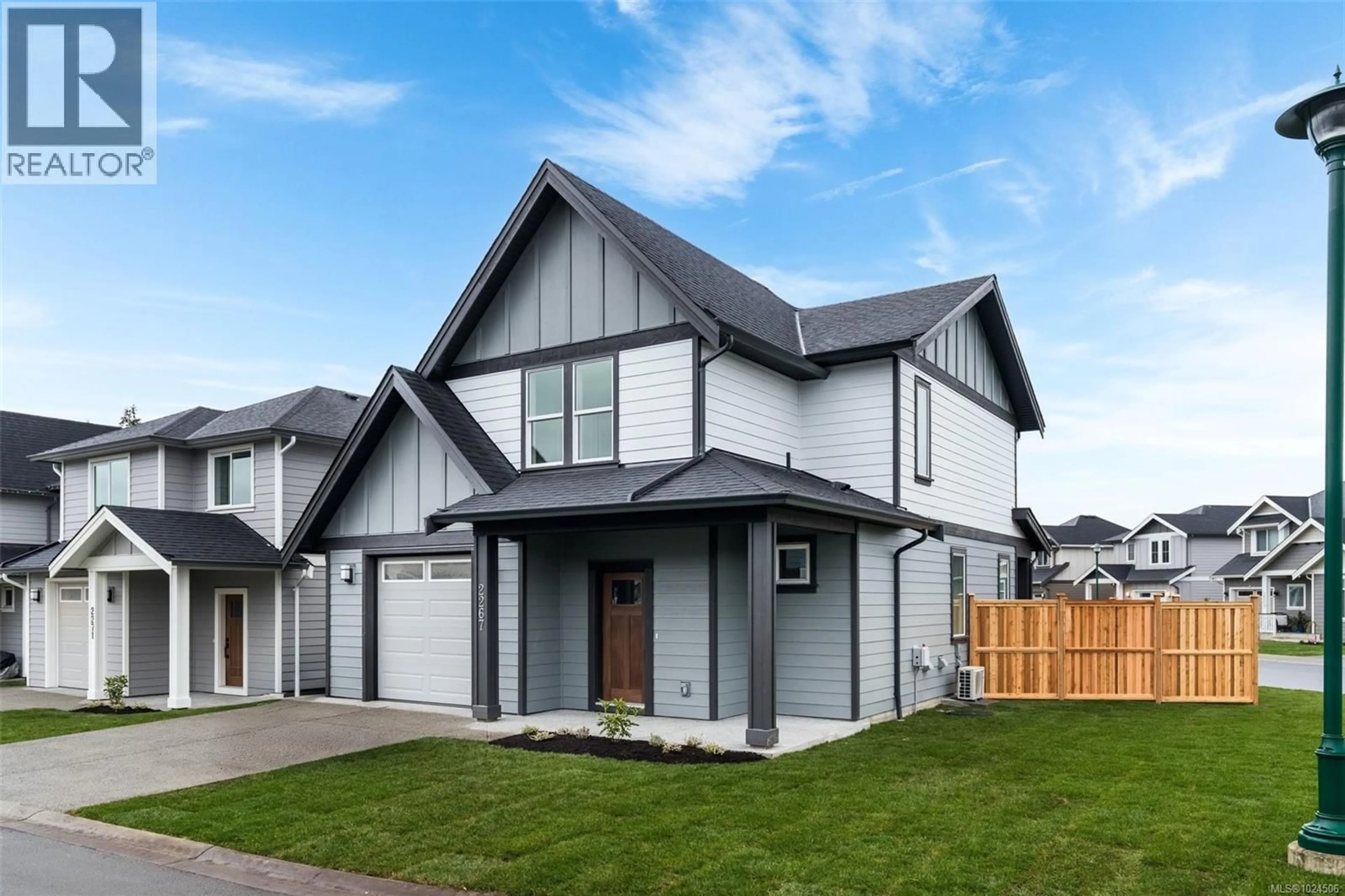 Home with vinyl exterior material, street for 2267 EVELYN LANE, Sooke British Columbia V9Z0W3