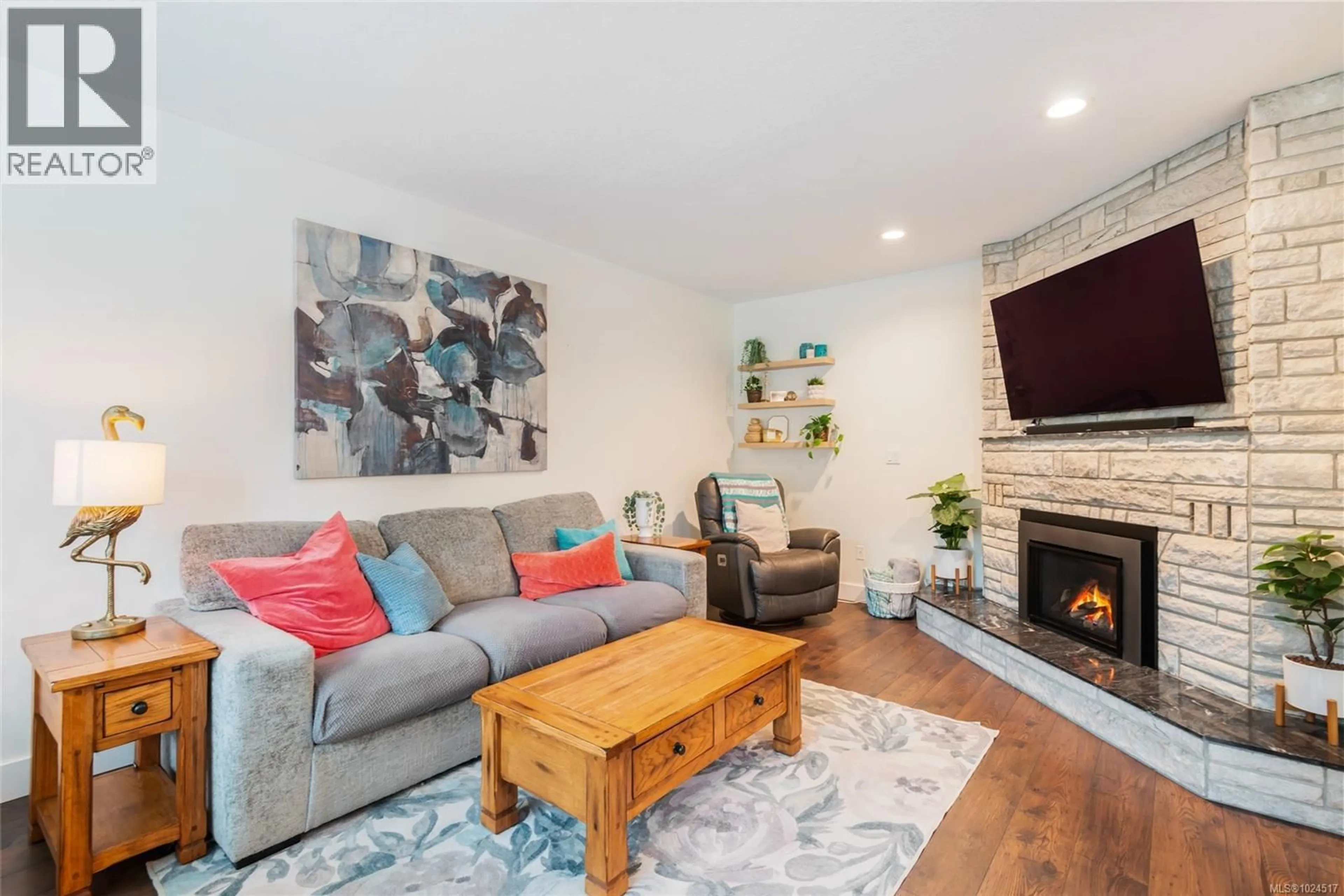 Living room with furniture, wood/laminate floor for 2452 15TH AVENUE, Port Alberni British Columbia V9Y2Z7