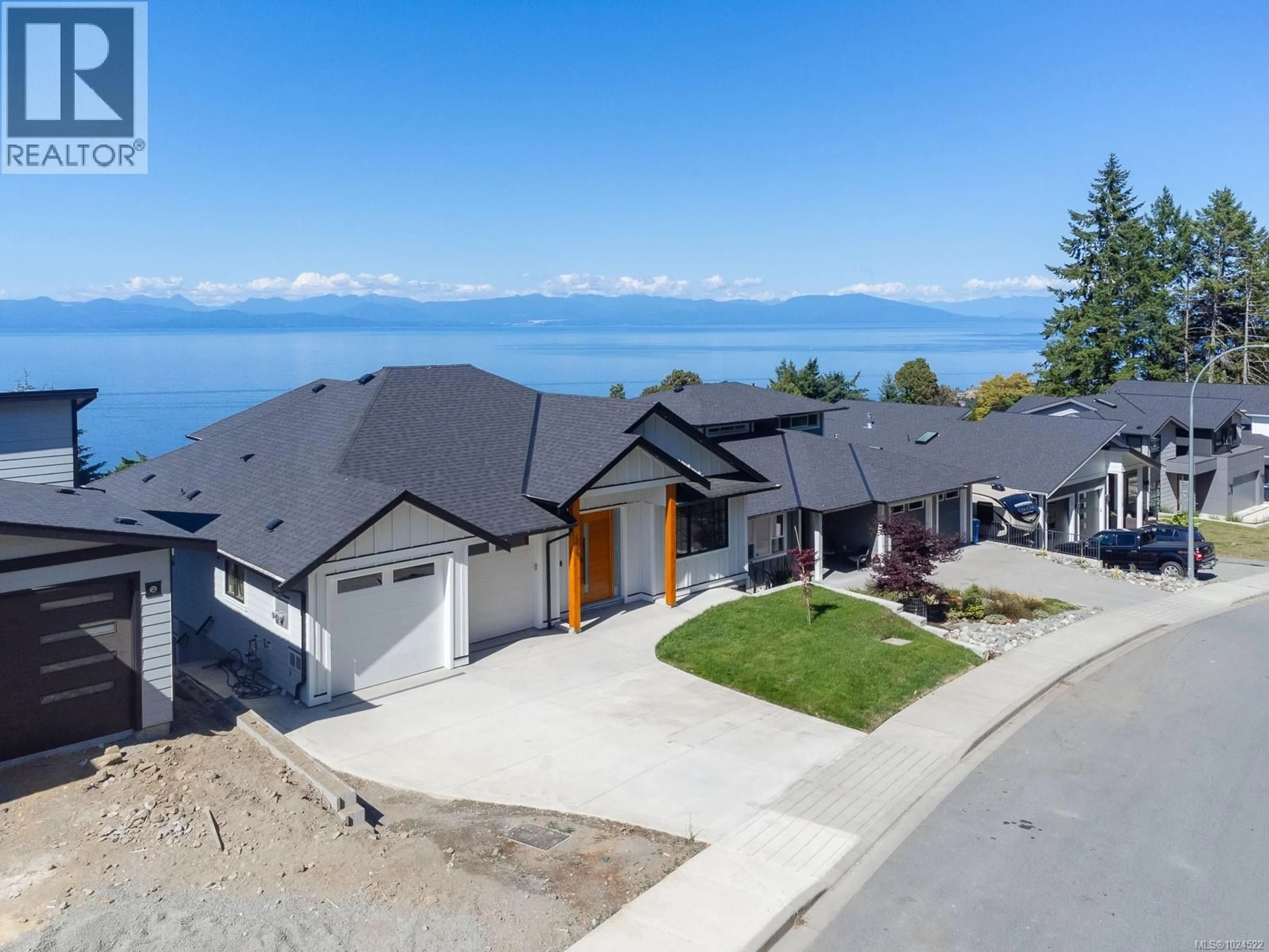 A pic from outside/outdoor area/front of a property/back of a property/a pic from drone, water/lake/river/ocean view for 120 HAWK POINT ROAD, Nanaimo British Columbia V9T5W2