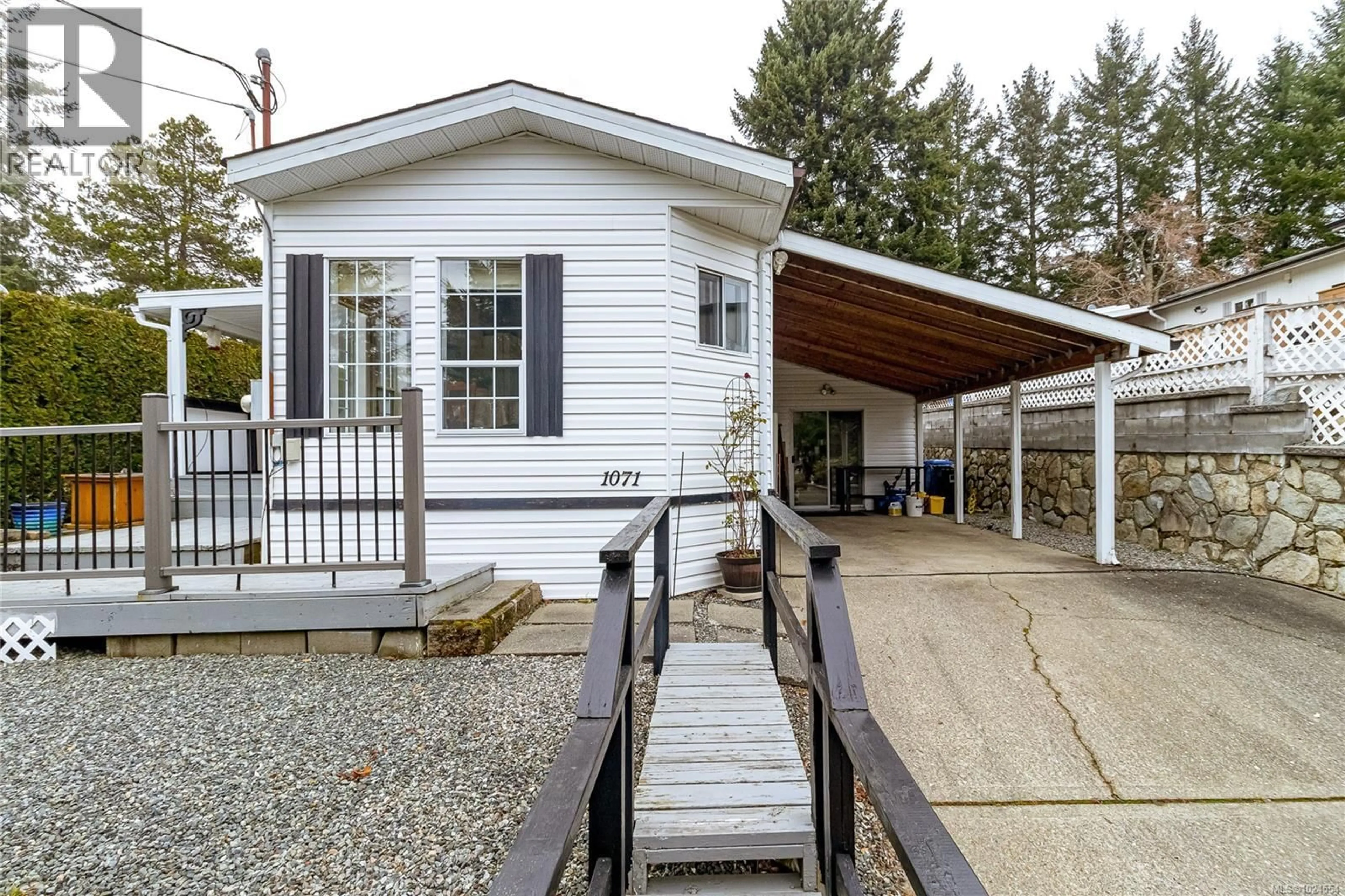 Home with vinyl exterior material, street for 1071 BOURBAN ROAD, Mill Bay British Columbia V0R2P2