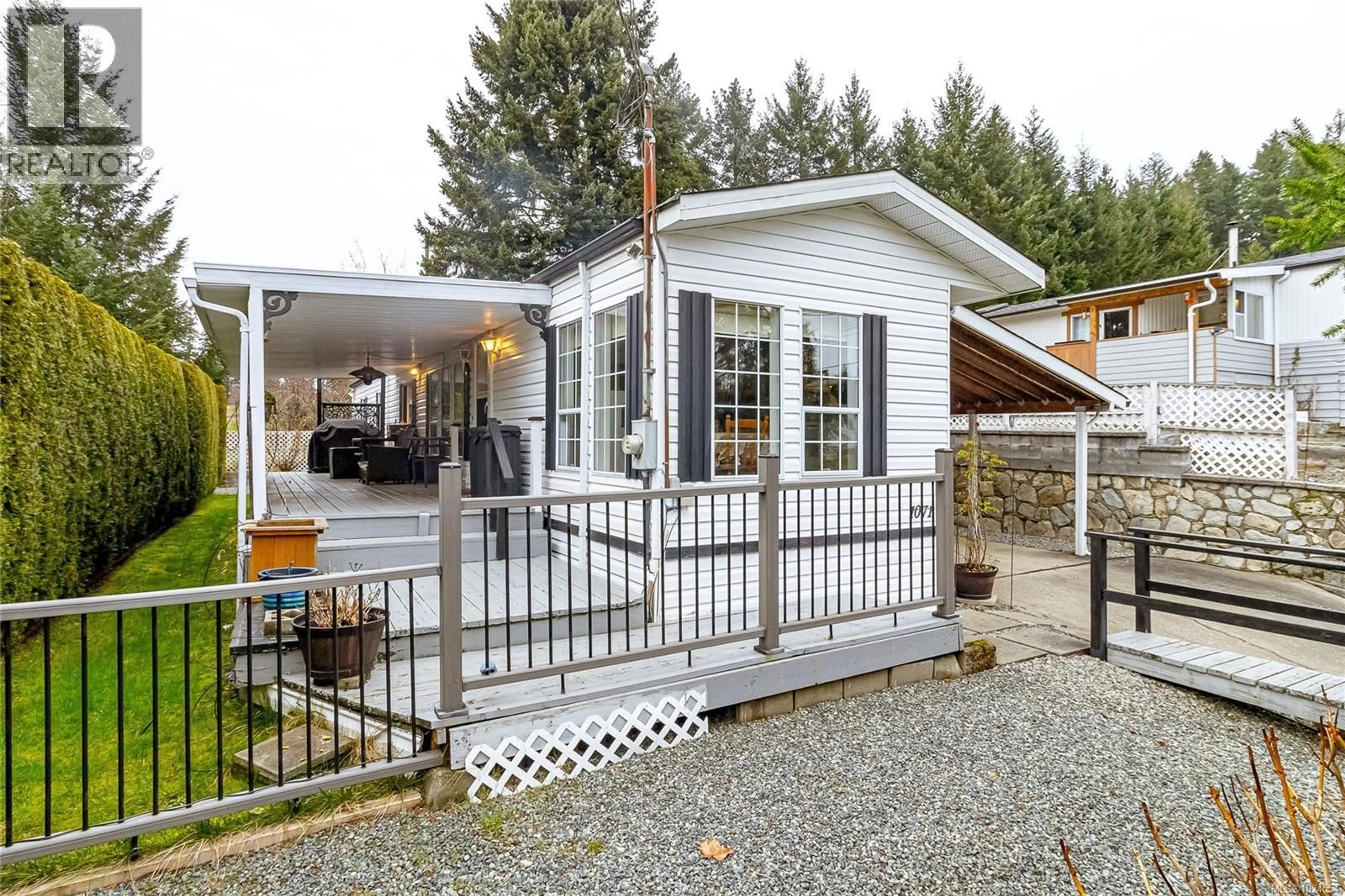 Home with vinyl exterior material, street for 1071 BOURBAN ROAD, Mill Bay British Columbia V0R2P2