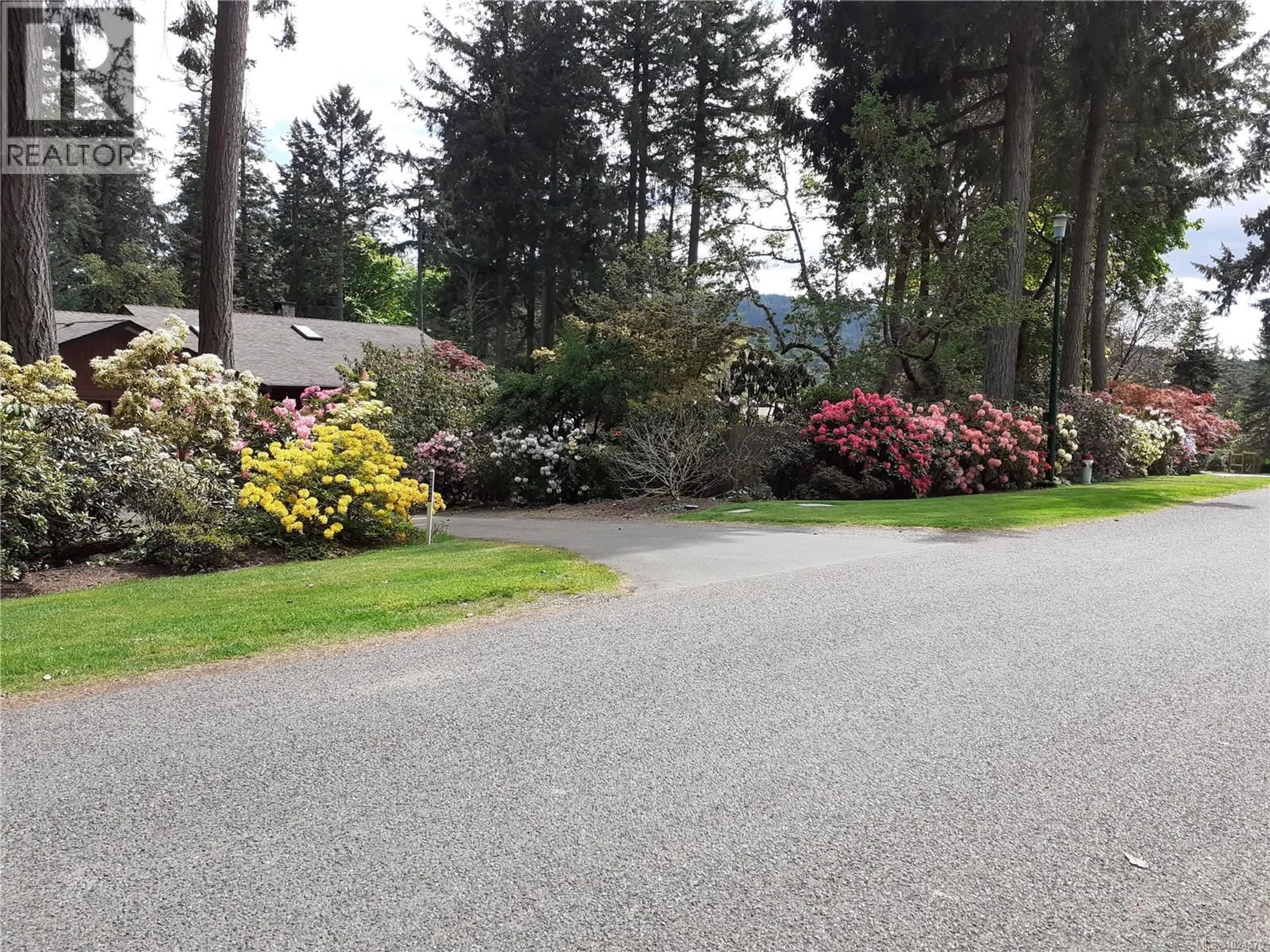 A pic from outside/outdoor area/front of a property/back of a property/a pic from drone, unknown for 9343 CARNOUSTIE CRESCENT, North Saanich British Columbia V8L5G7