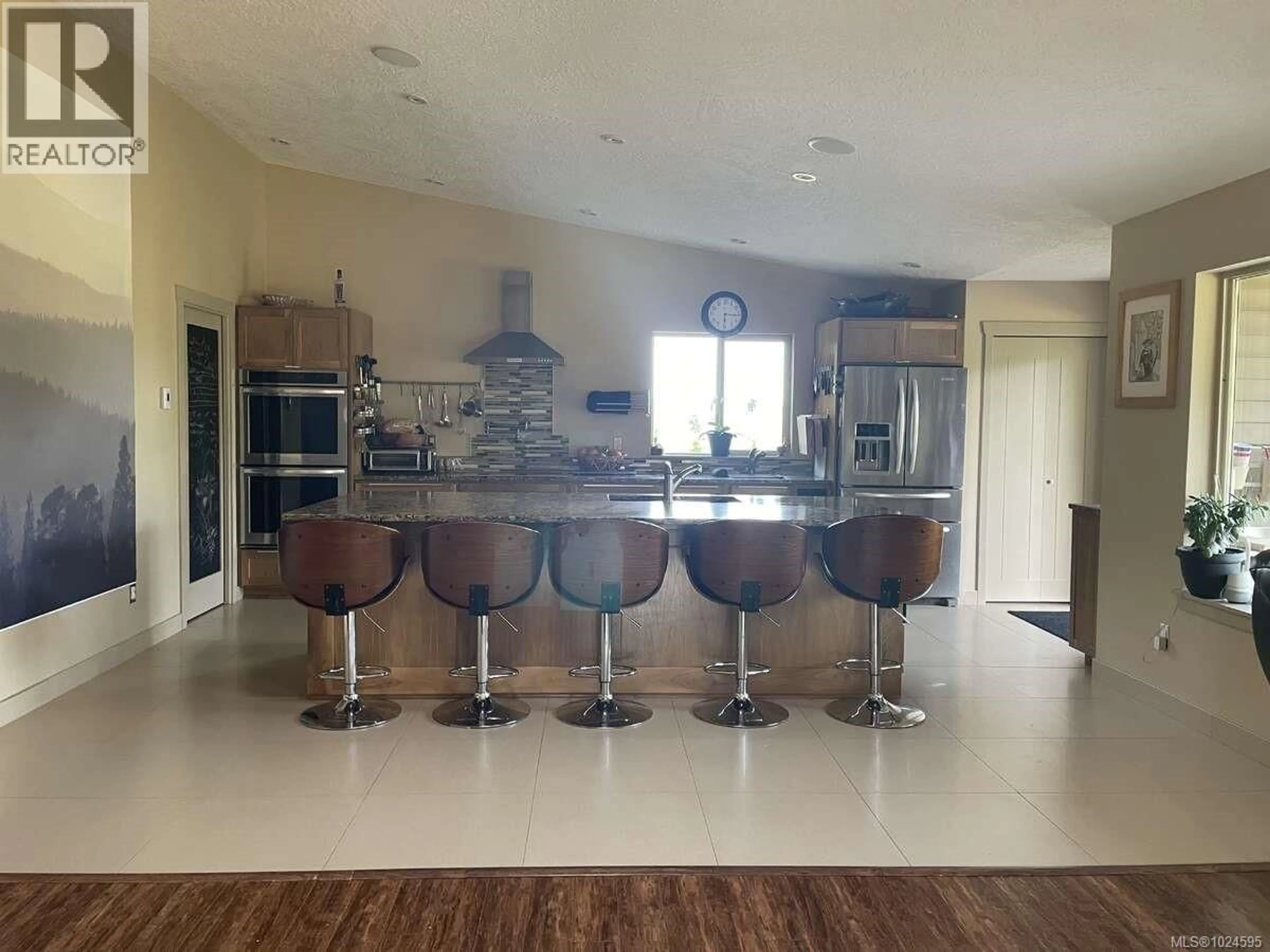 Open concept kitchen, ceramic/tile floor for 1680 PELIGREN PLACE, Qualicum Beach British Columbia V9K2S3