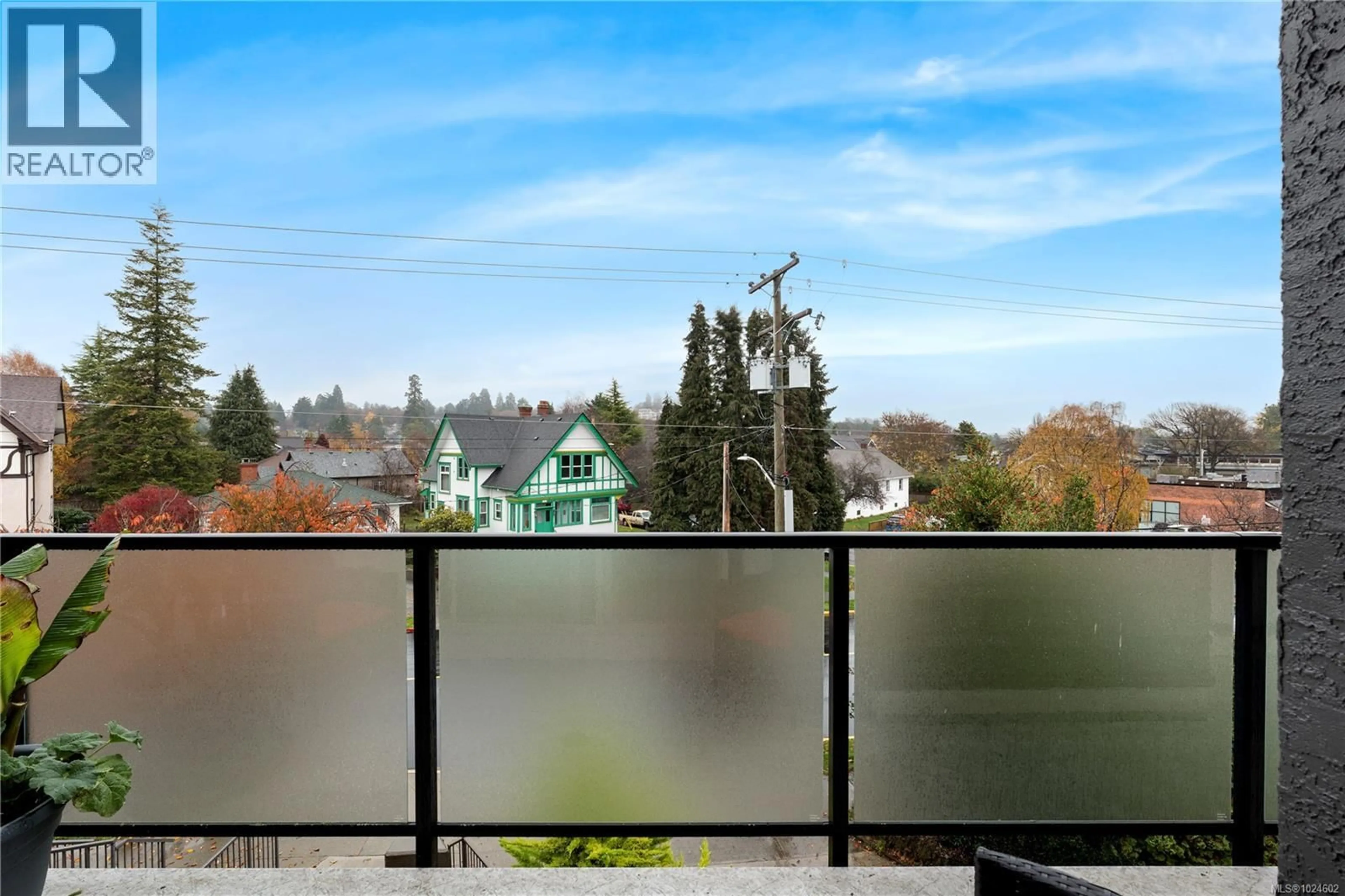 Balcony in the apartment, city buildings view from balcony for 402 - 1241 FAIRFIELD ROAD, Victoria British Columbia V8V3B3