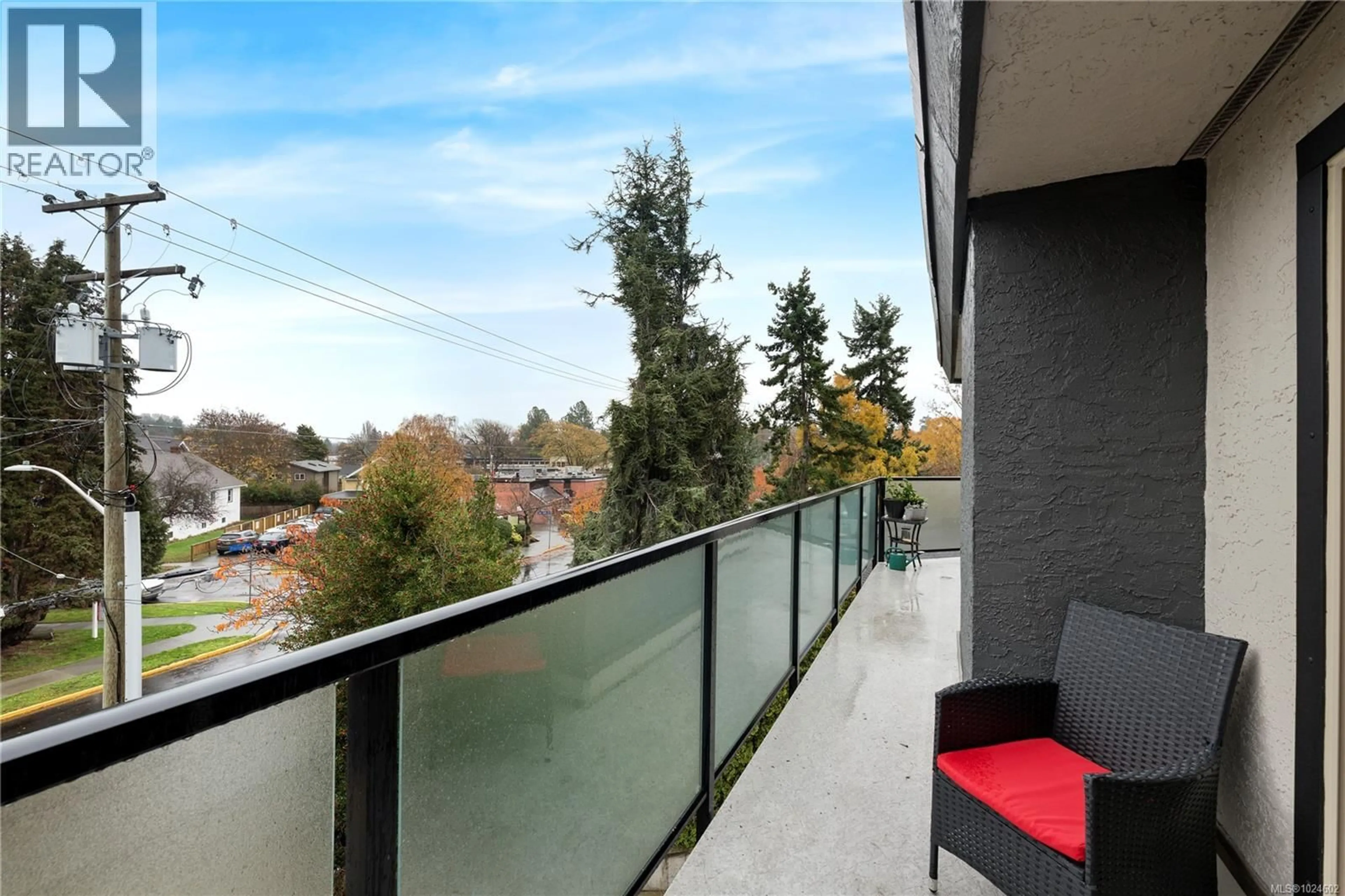 Balcony in the apartment, city buildings view from balcony for 402 - 1241 FAIRFIELD ROAD, Victoria British Columbia V8V3B3