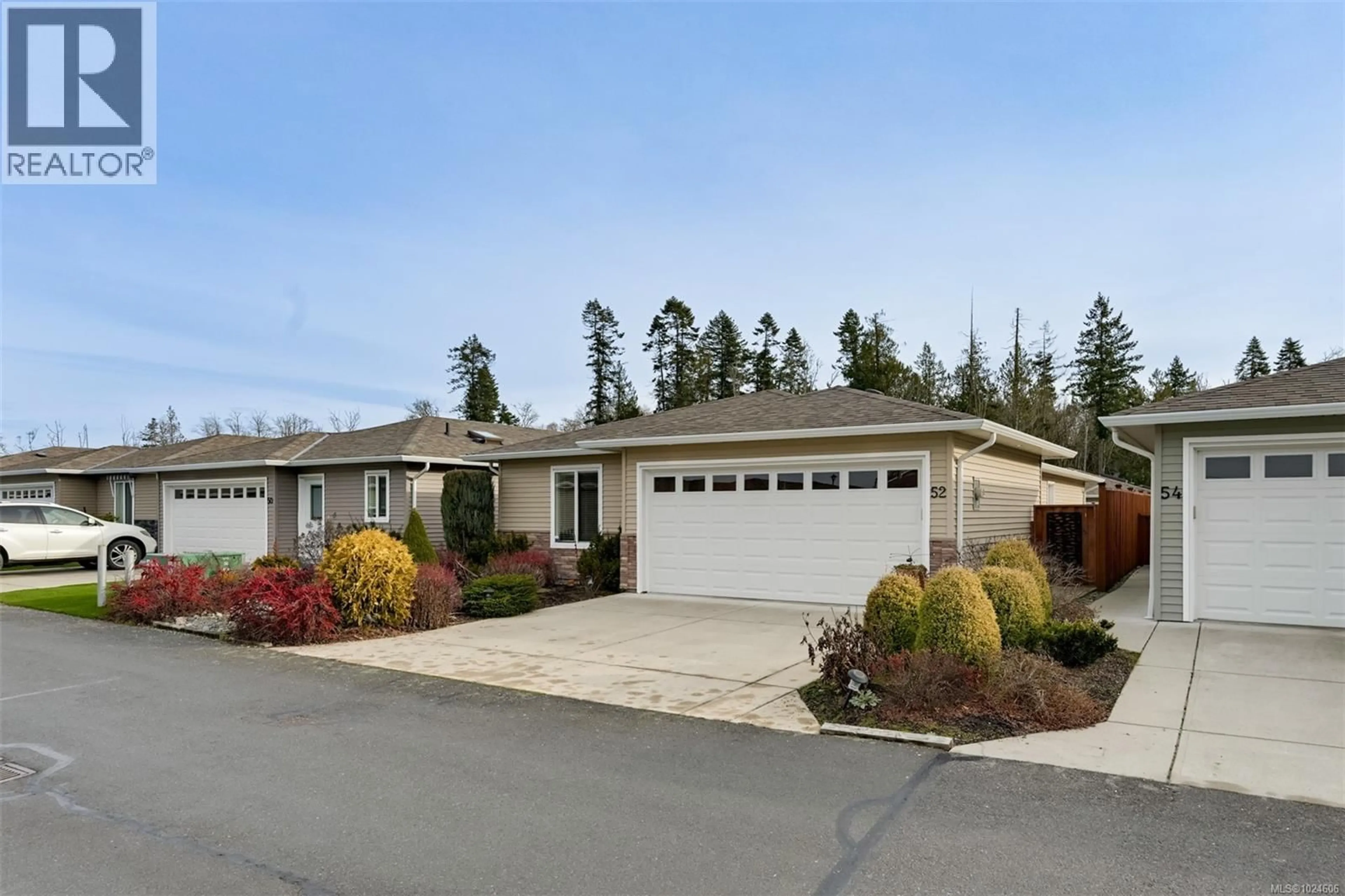 Home with vinyl exterior material, street for 52 - 7586 TETAYUT ROAD, Central Saanich British Columbia V8M0B4