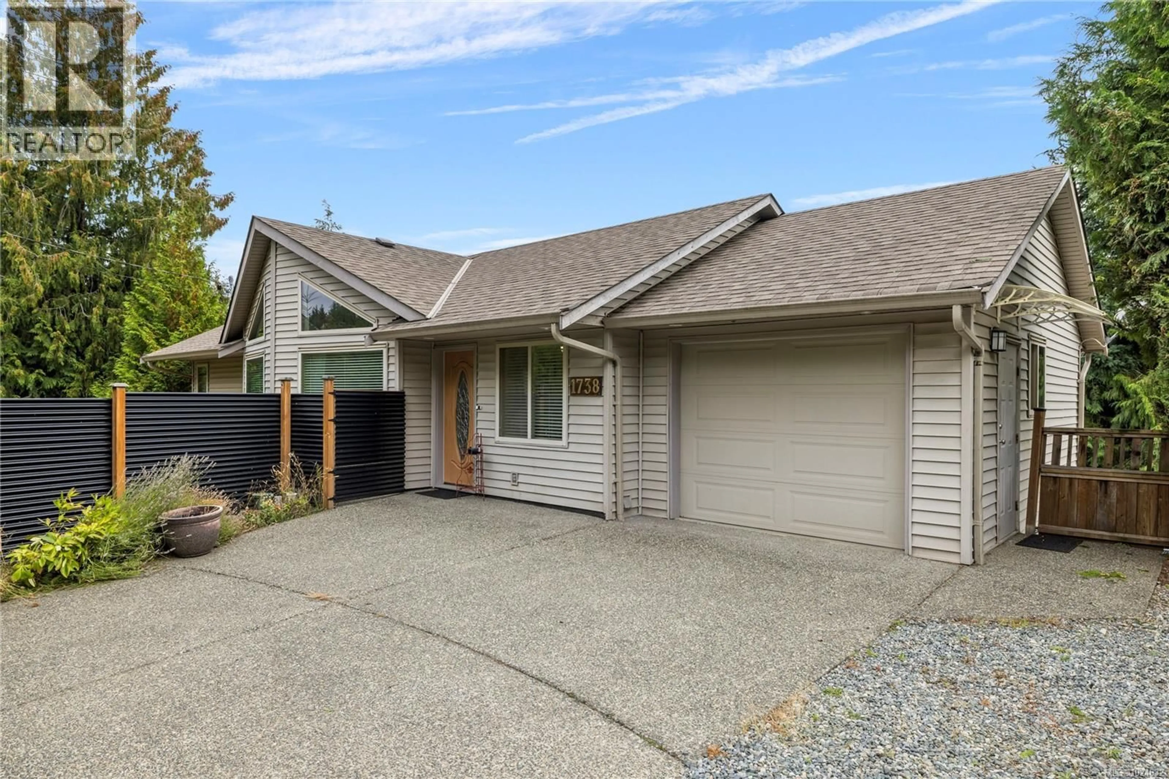 Home with vinyl exterior material, street for 1738 MARTINI WAY, Qualicum Beach British Columbia V9K2S3