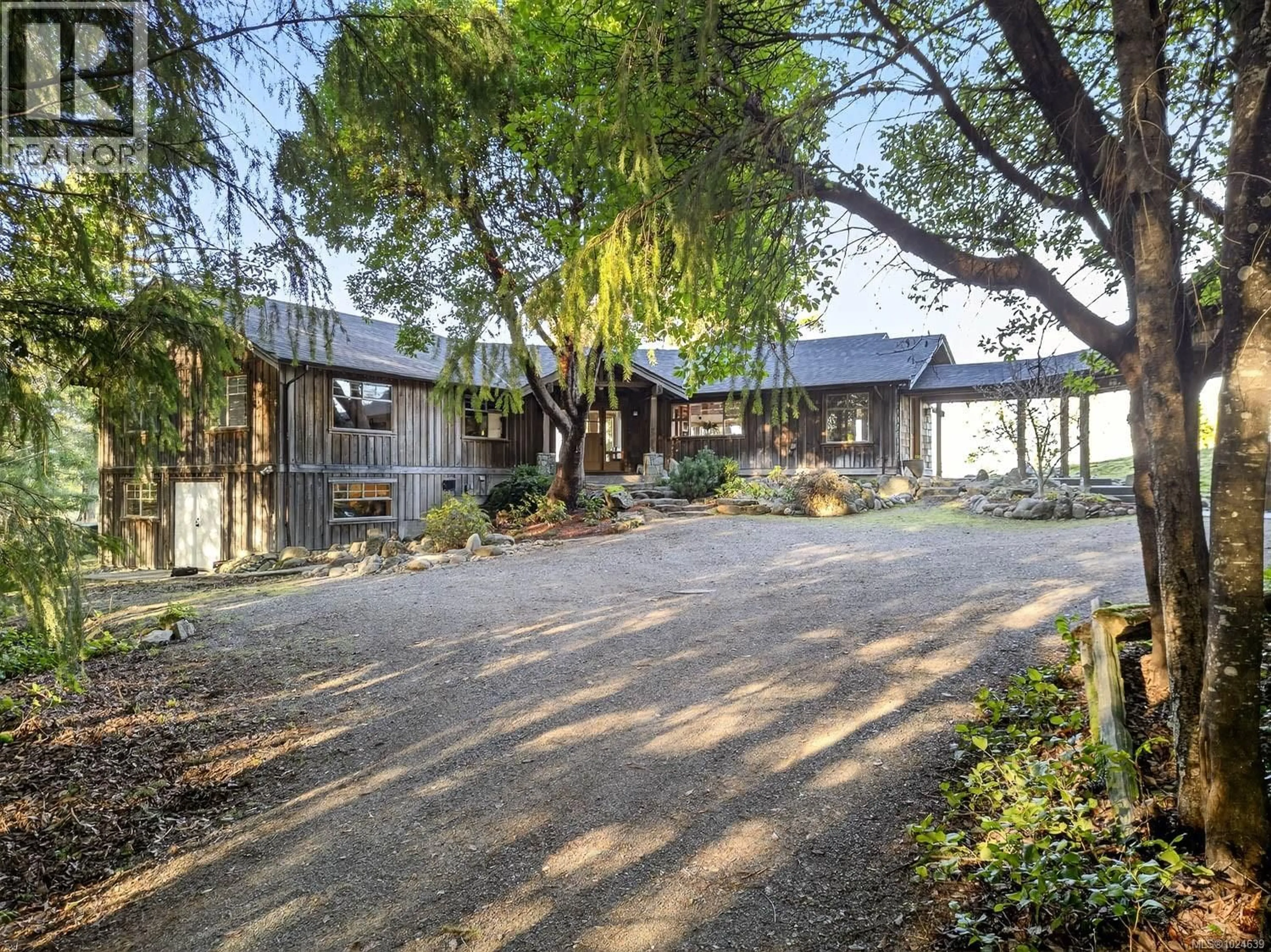 A pic from outside/outdoor area/front of a property/back of a property/a pic from drone, street for 186 SARAH WAY, Salt Spring British Columbia V8K2X8