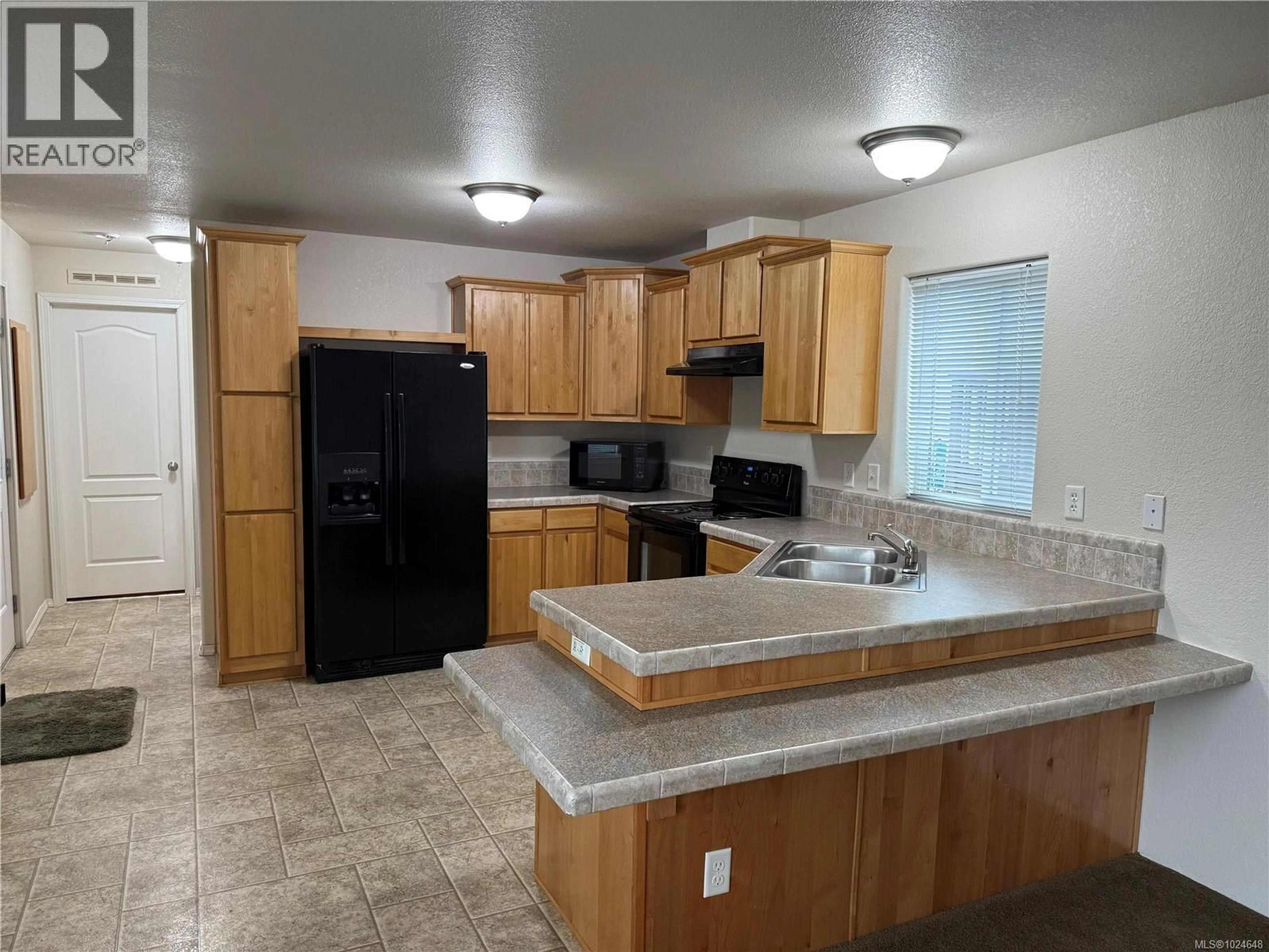 Standard kitchen, ceramic/tile floor for 18 - 525 JIM CRAM DRIVE, Ladysmith British Columbia V9G0A5