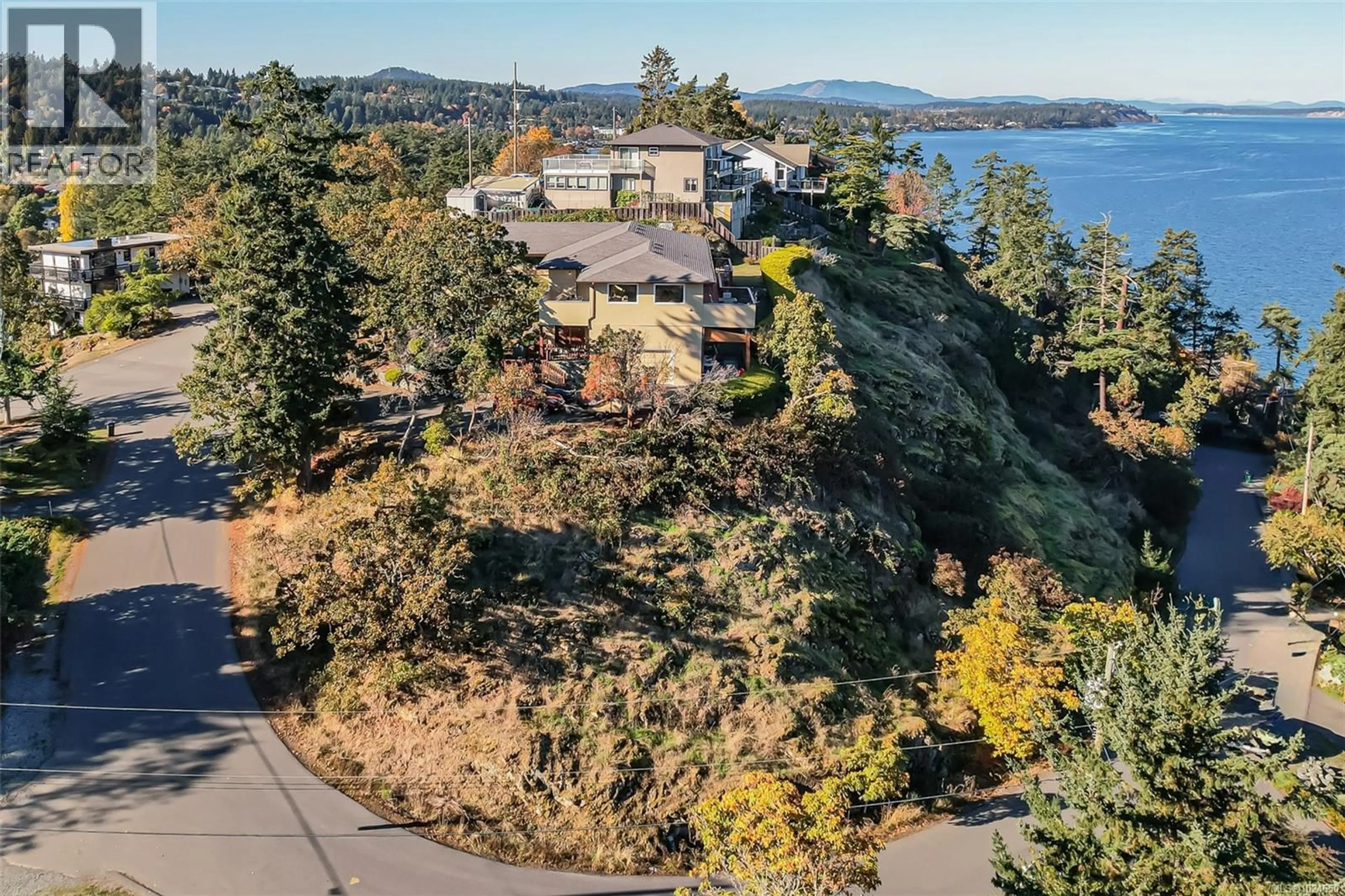A pic from outside/outdoor area/front of a property/back of a property/a pic from drone, water/lake/river/ocean view for 4727 TREETOP HEIGHTS, Saanich British Columbia V8Y1E3