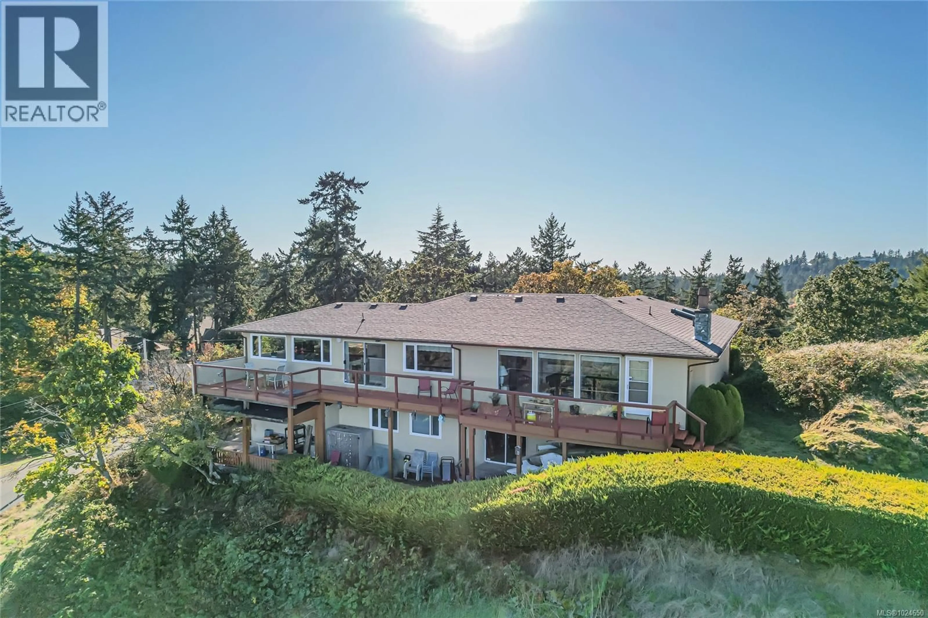 A pic from outside/outdoor area/front of a property/back of a property/a pic from drone, water/lake/river/ocean view for 4727 TREETOP HEIGHTS, Saanich British Columbia V8Y1E3