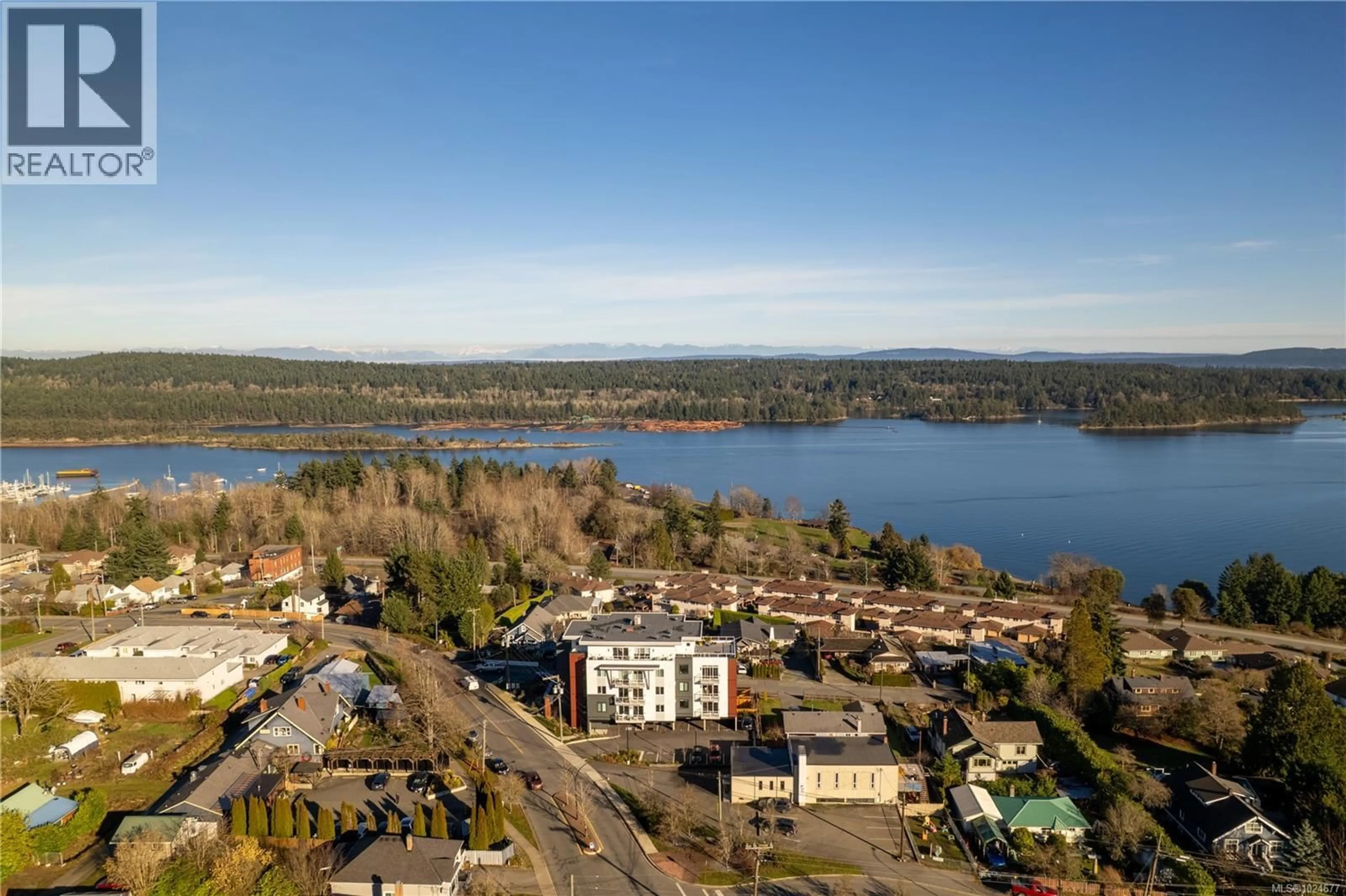 A pic from outside/outdoor area/front of a property/back of a property/a pic from drone, water/lake/river/ocean view for 301 - 201 DOGWOOD DRIVE, Ladysmith British Columbia V9G0C3