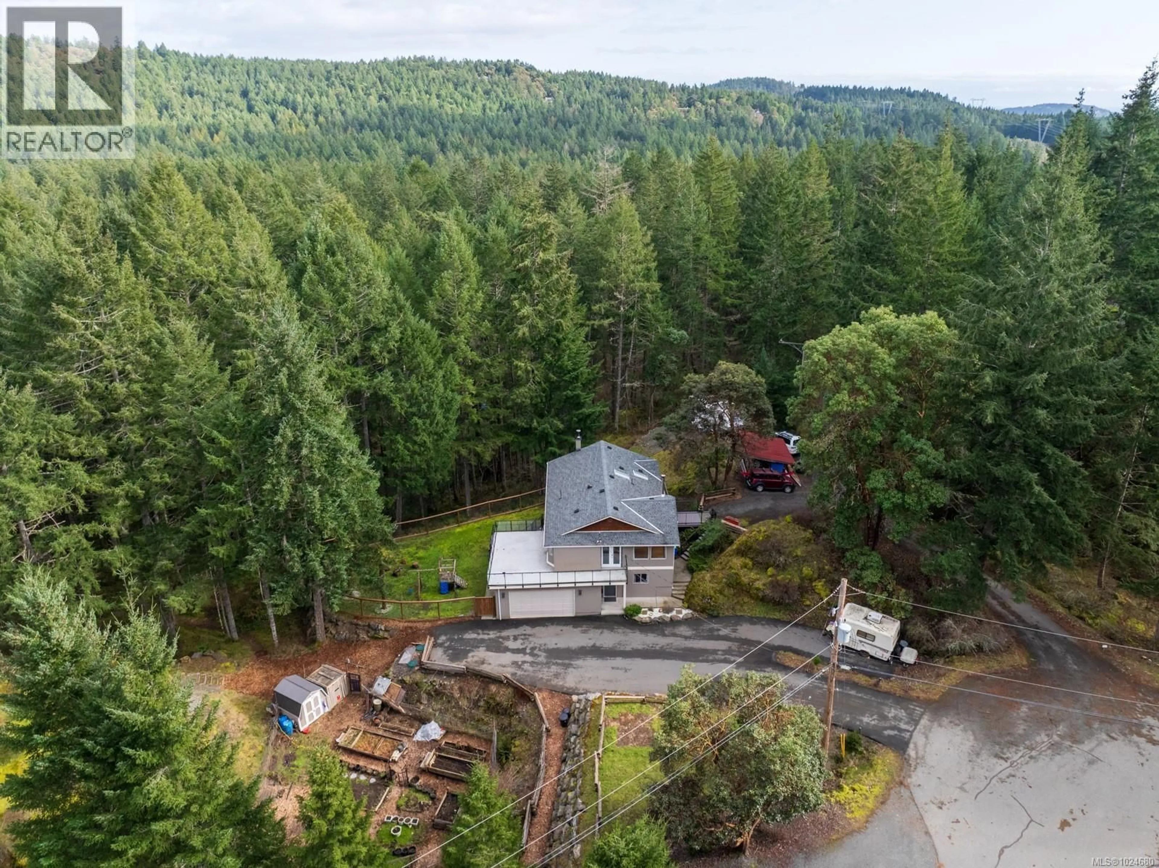 A pic from outside/outdoor area/front of a property/back of a property/a pic from drone, forest/trees view for 530 LONE TREE PLACE, Highlands British Columbia V9B6G9