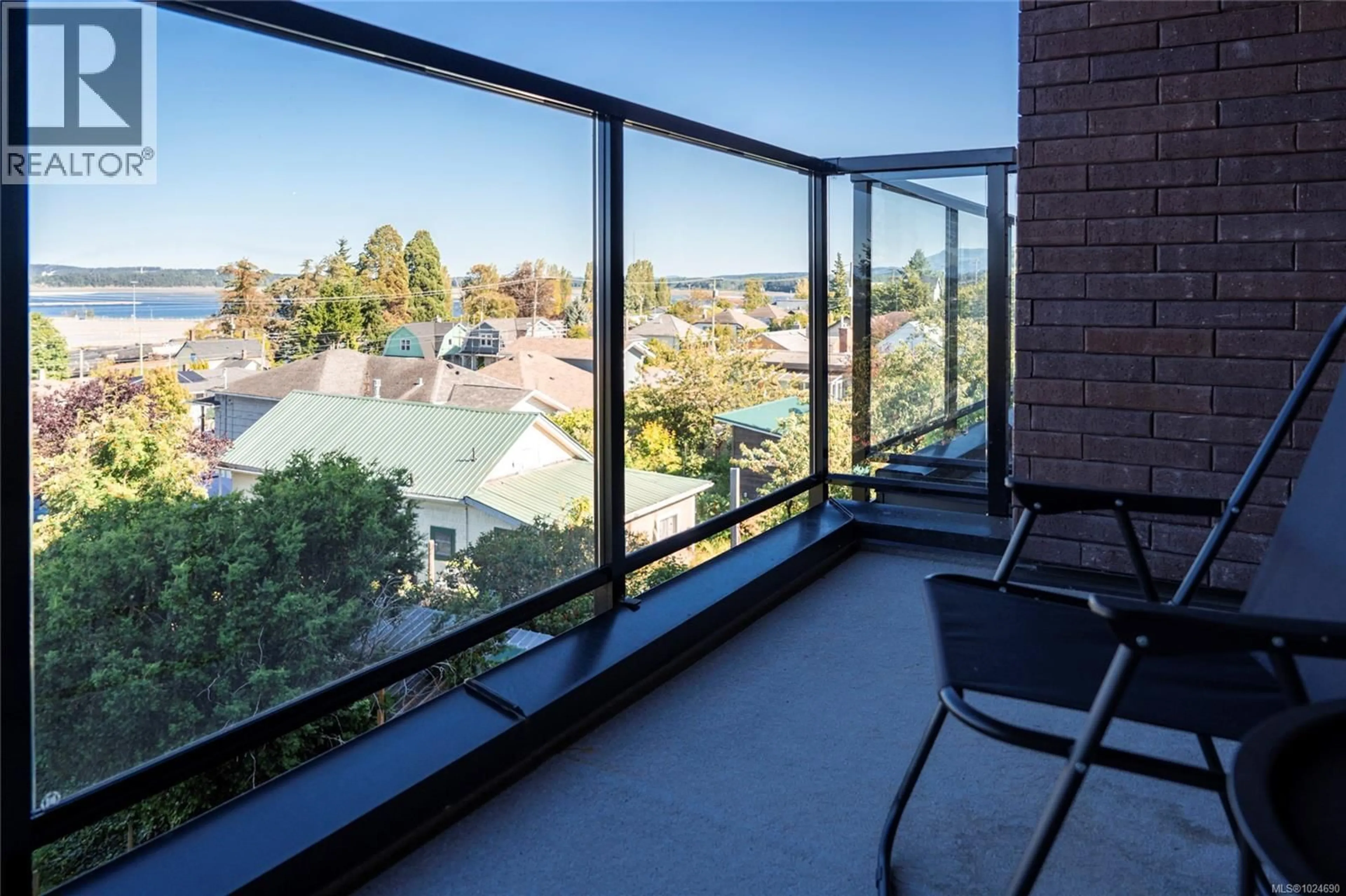 Balcony in the apartment, city buildings view from balcony for 403 - 45 HALIBURTON STREET, Nanaimo British Columbia V9R4V6