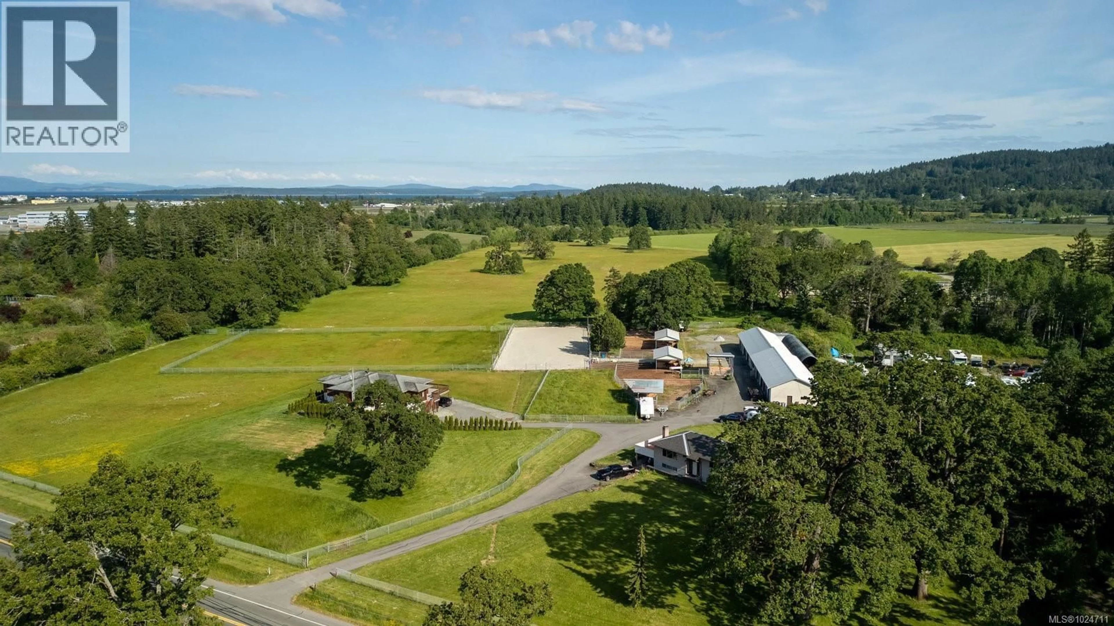 A pic from outside/outdoor area/front of a property/back of a property/a pic from drone, mountain view for 9775 WEST SAANICH ROAD, North Saanich British Columbia V8L5T5