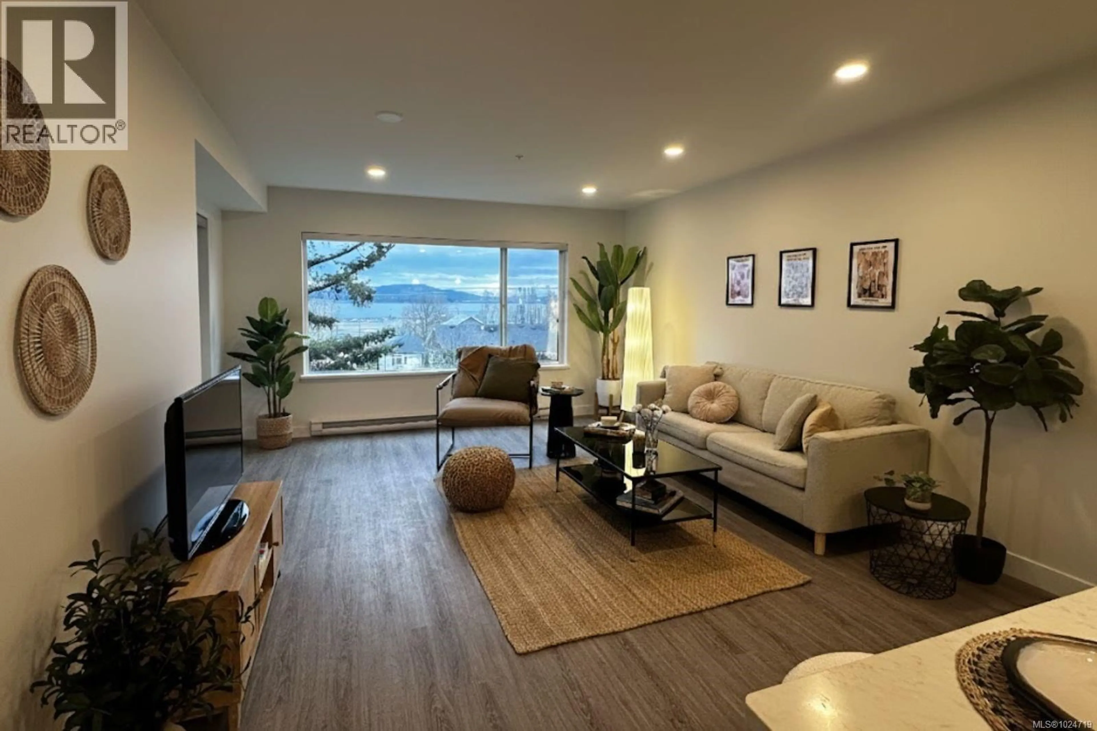 Living room with furniture, unknown for 206 - 135 HALIBURTON STREET, Nanaimo British Columbia V9R4V9