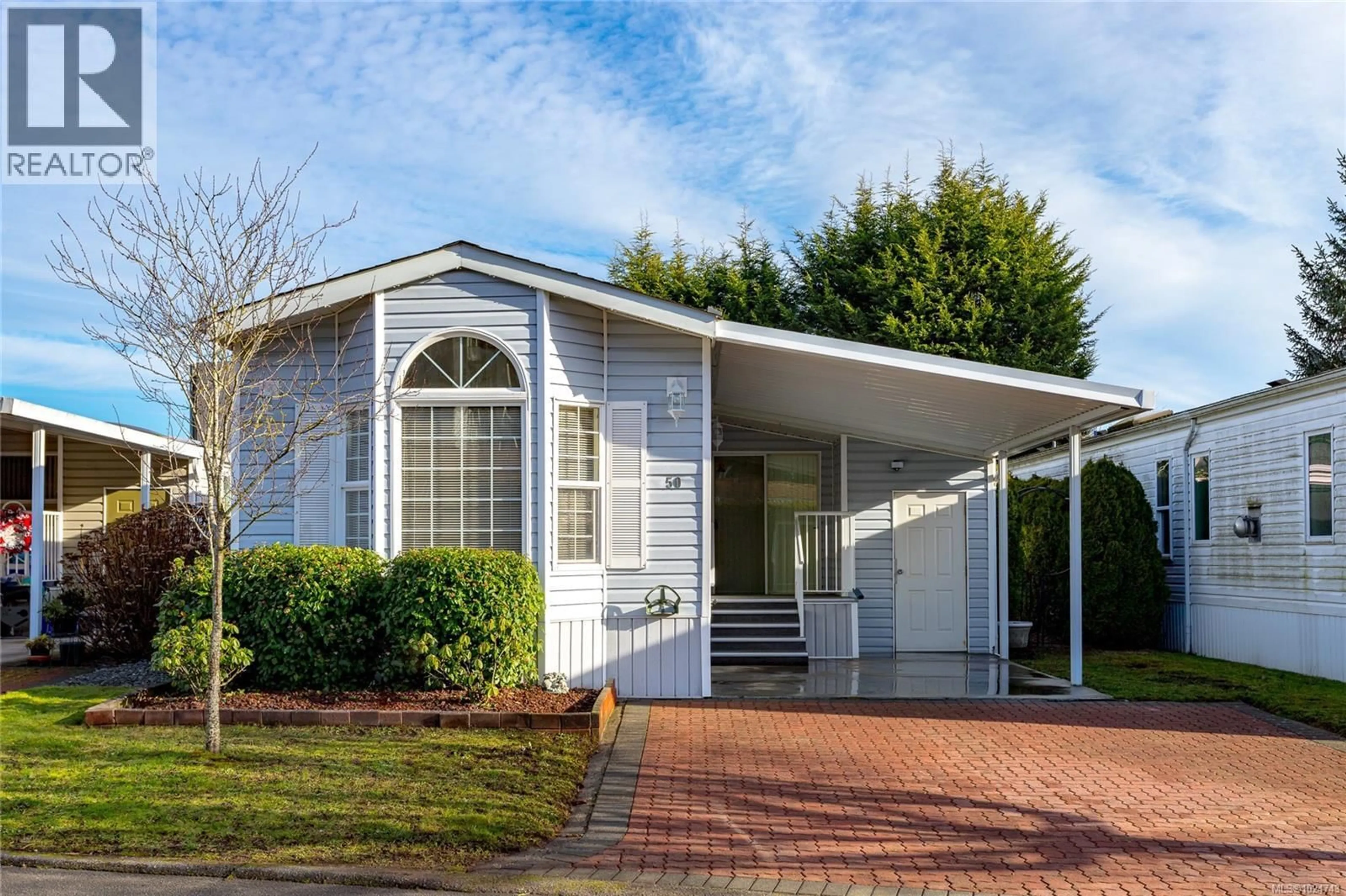 Home with vinyl exterior material, street for 50 - 7583 CENTRAL SAANICH ROAD, Central Saanich British Columbia V8M2B6